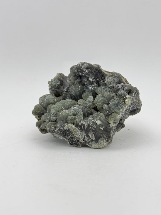 Raw prehnite specimen with amazing green color.