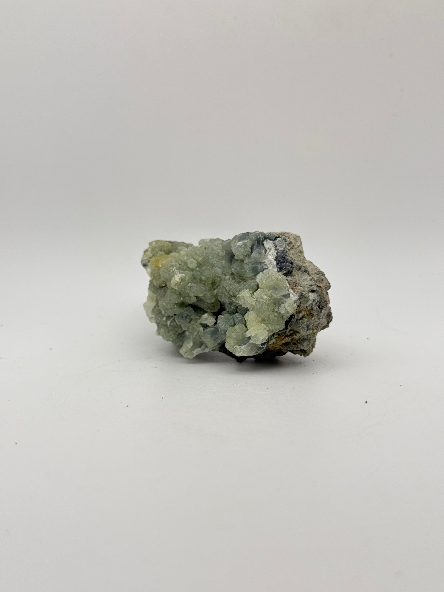 Raw prehnite specimen with amazing green color.