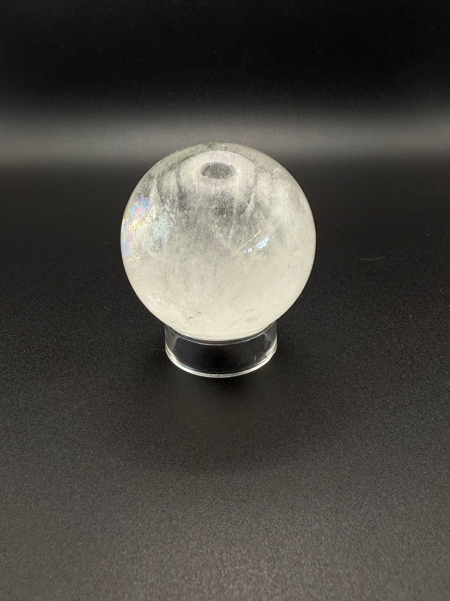 Clear quartz polished crystal sphere.