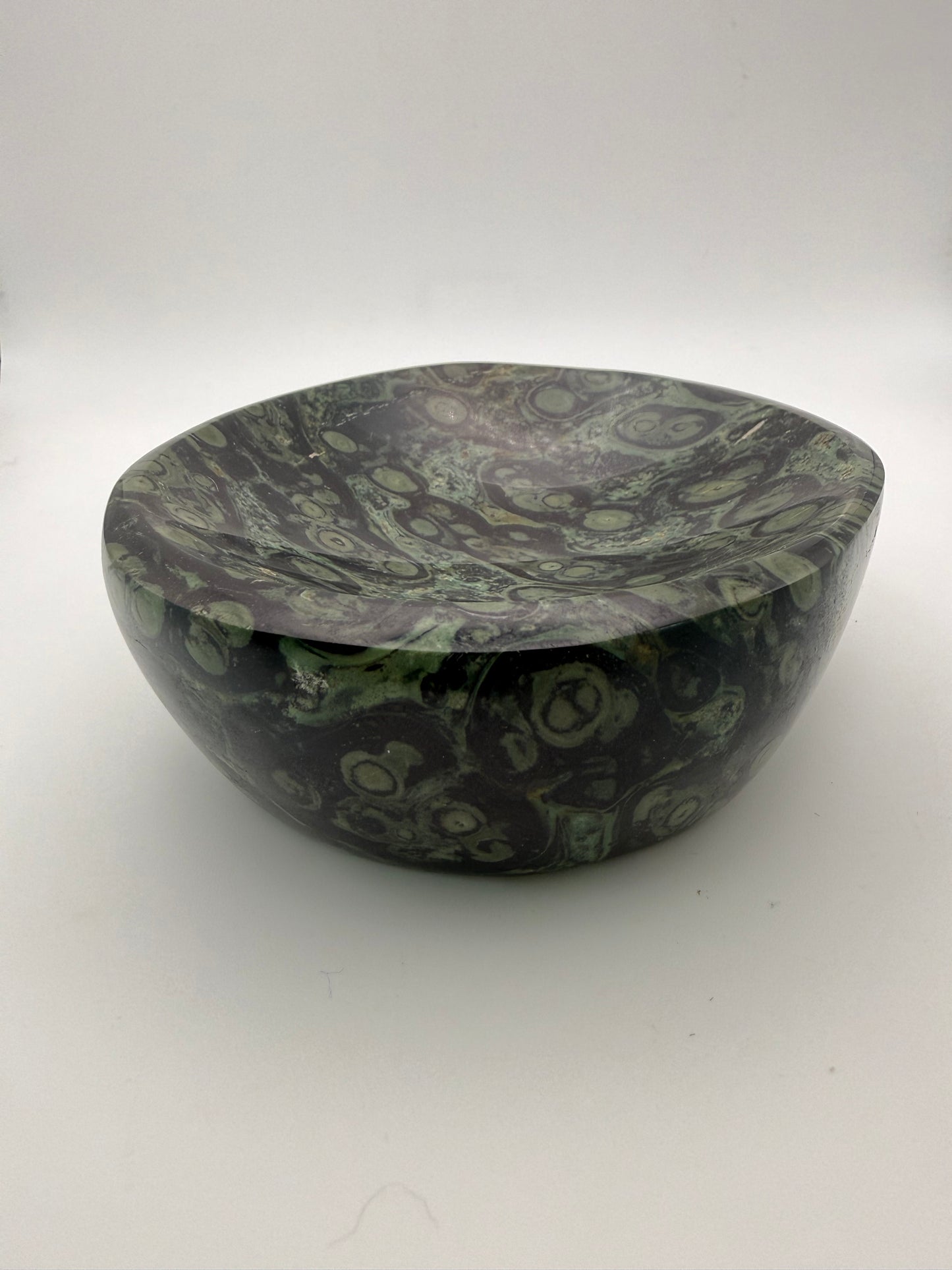 Polished kambaba jasper in the shape of a bowl.