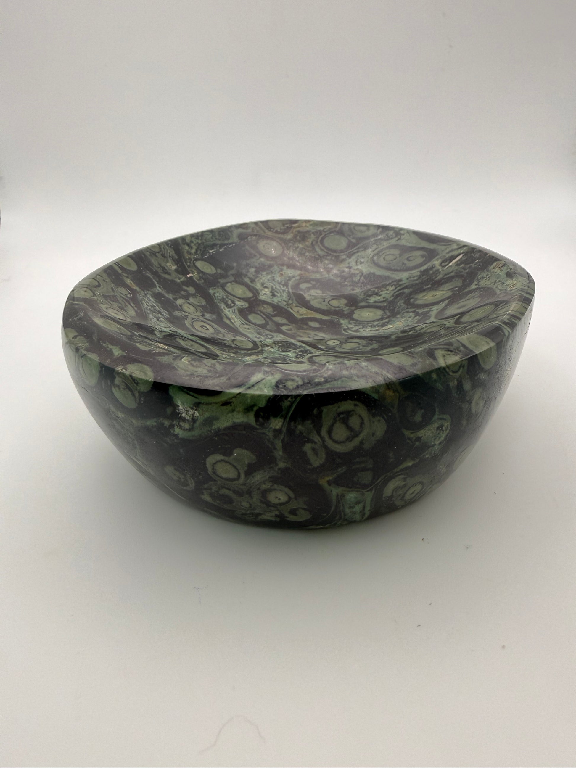 Polished kambaba jasper in the shape of a bowl.