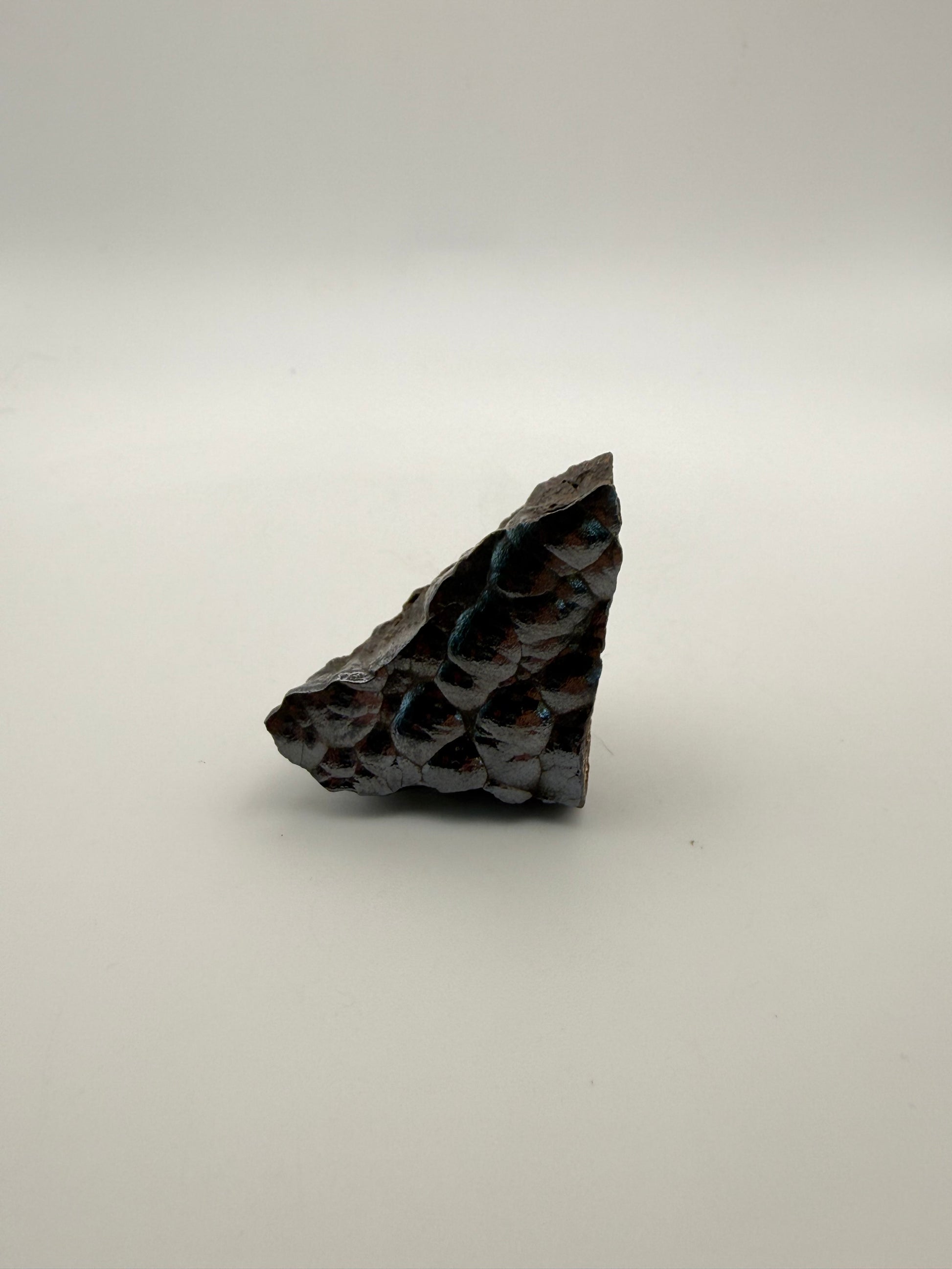 Small raw hematite specimen.