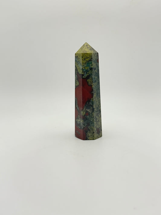 Polished Dragon Bloodstone in the shape of a tower.