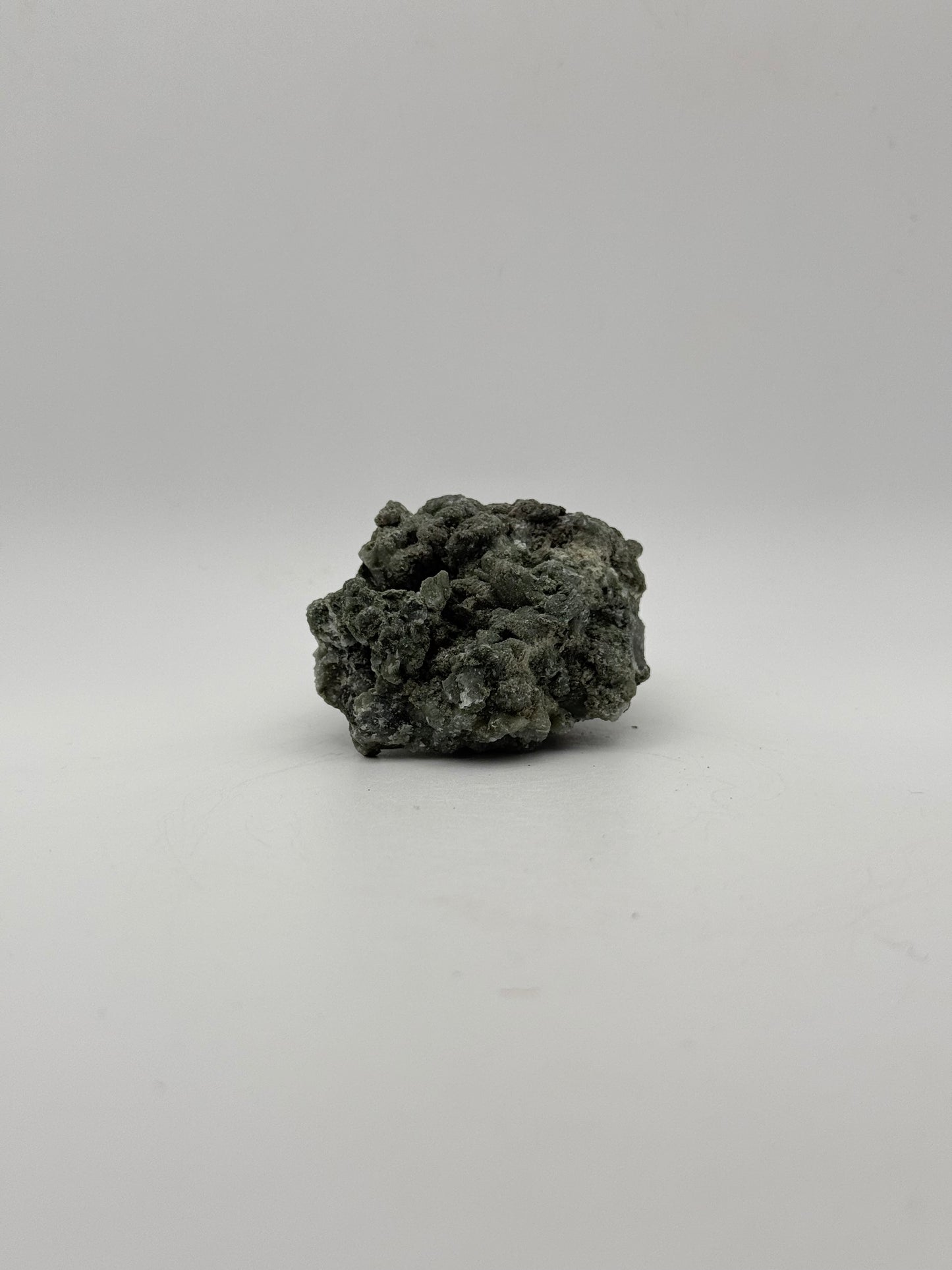 Raw prehnite specimen with amazing green color.