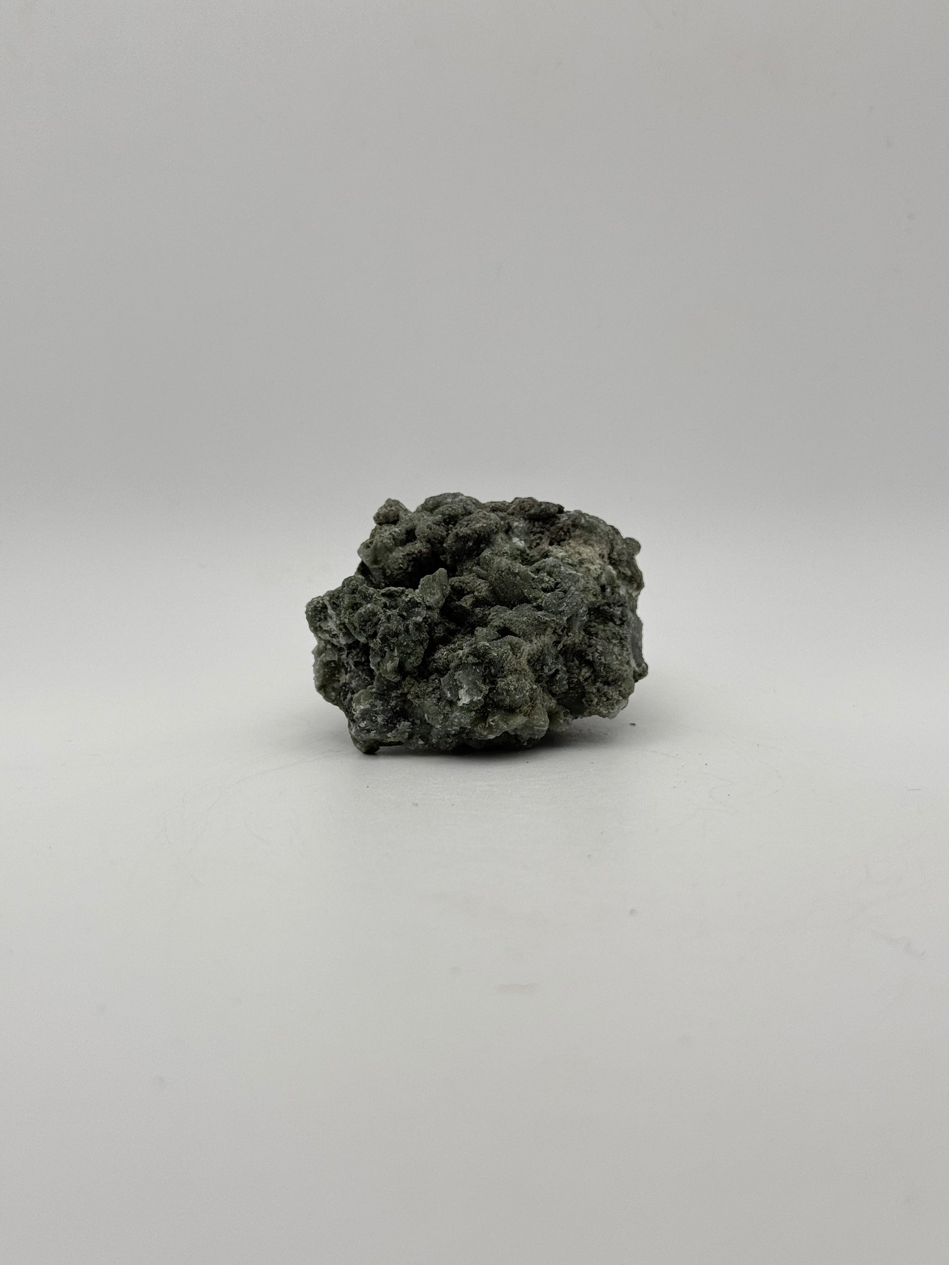 Raw prehnite specimen with amazing green color.