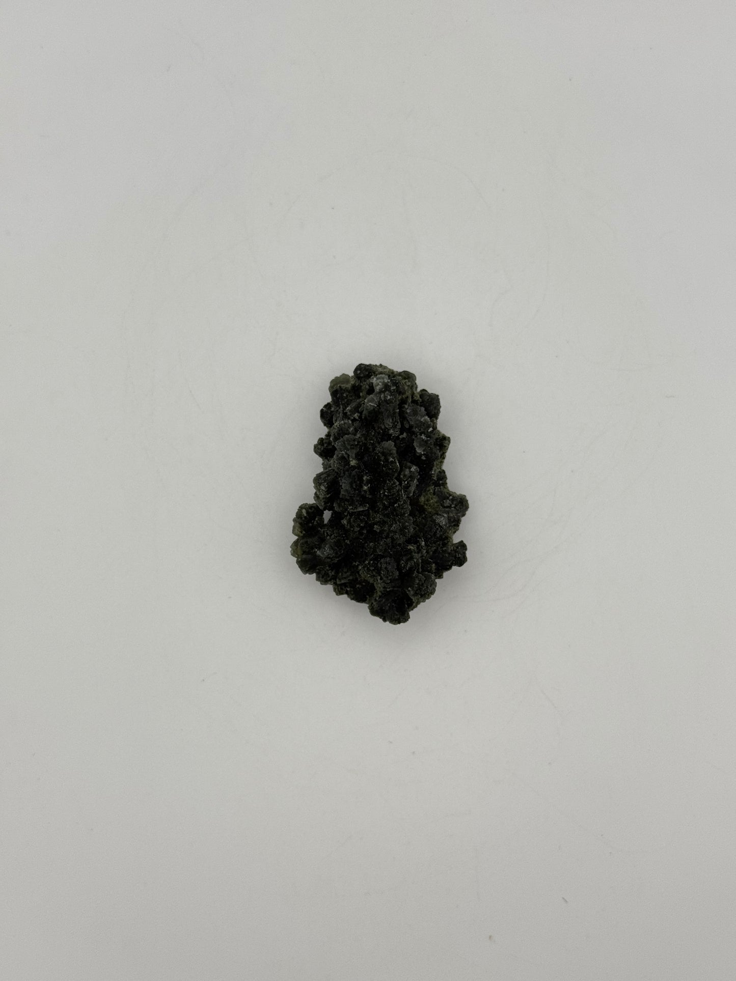 Raw prehnite specimen with amazing green color.