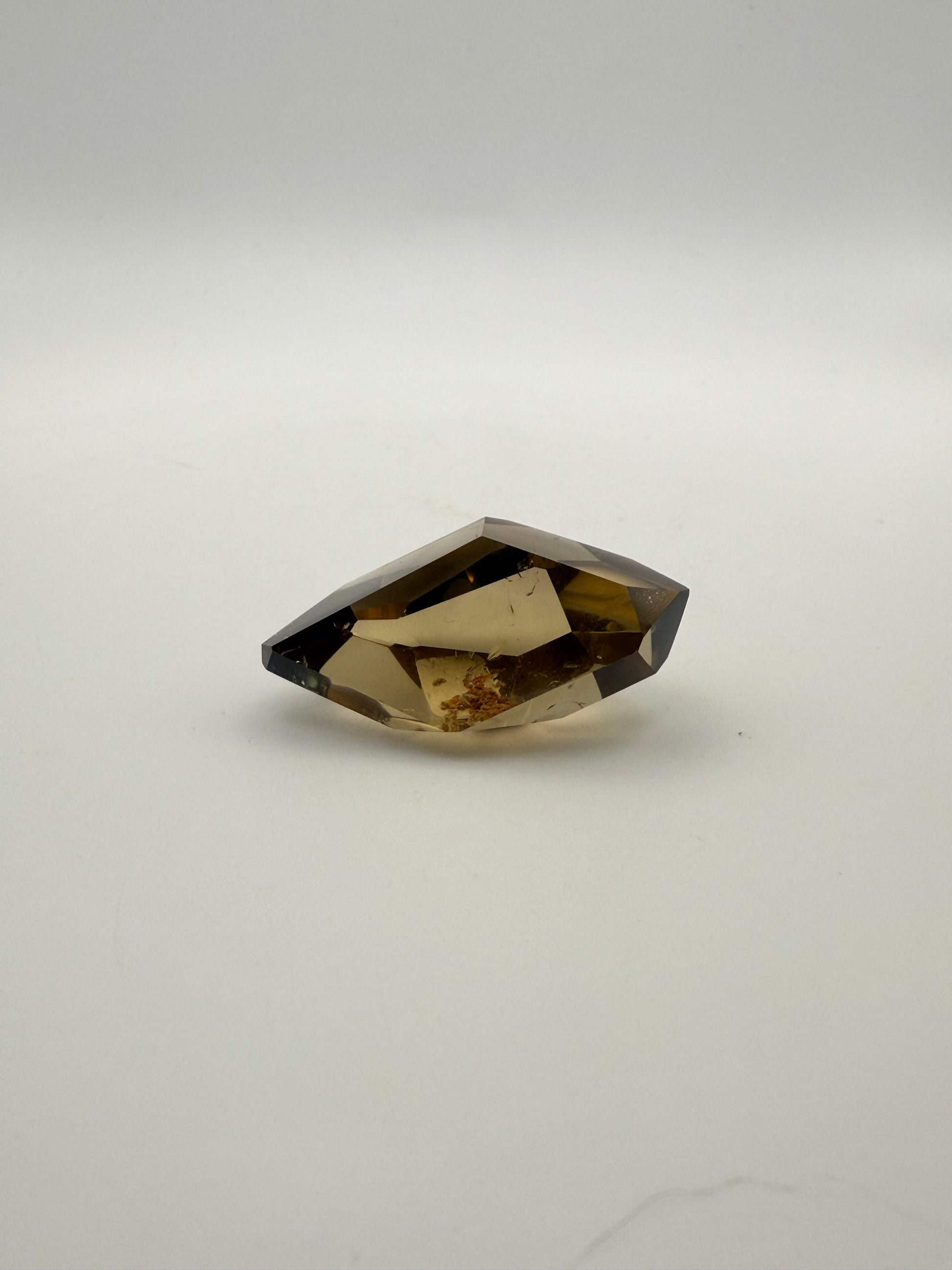 Polished natural citrine point.