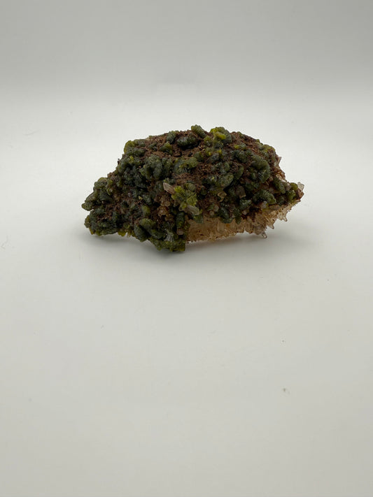 Epidote crystal cluster with good green color.