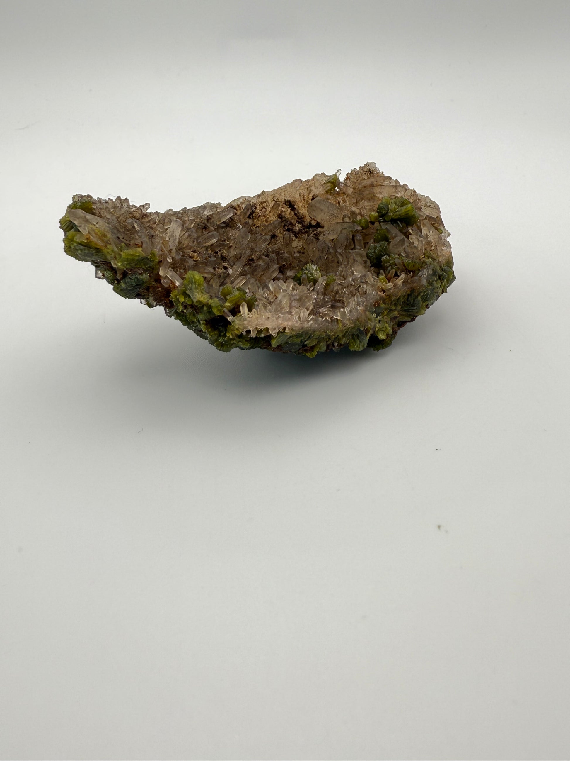 Epidote crystal cluster with good green color.
