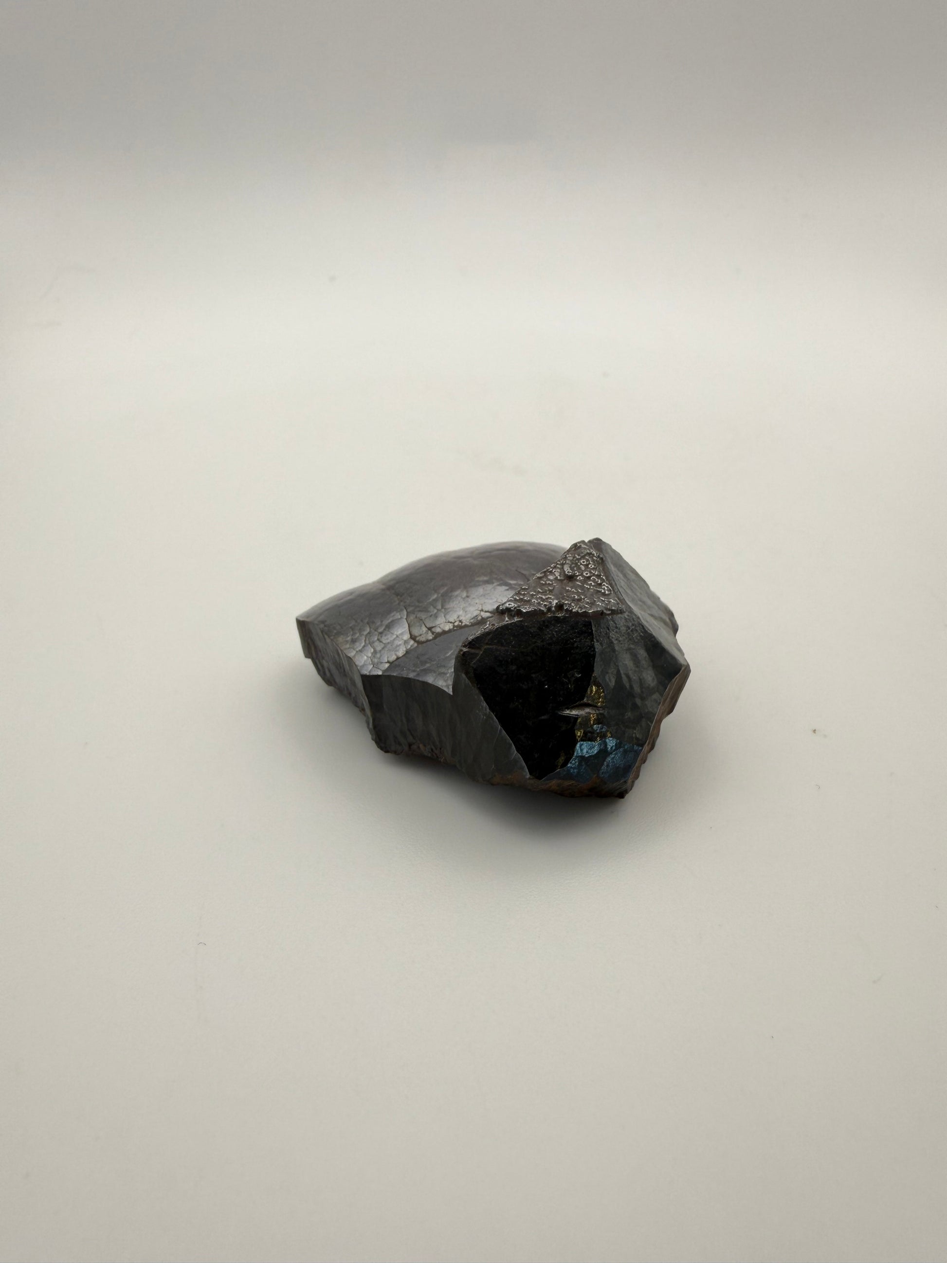 Small raw hematite specimen.