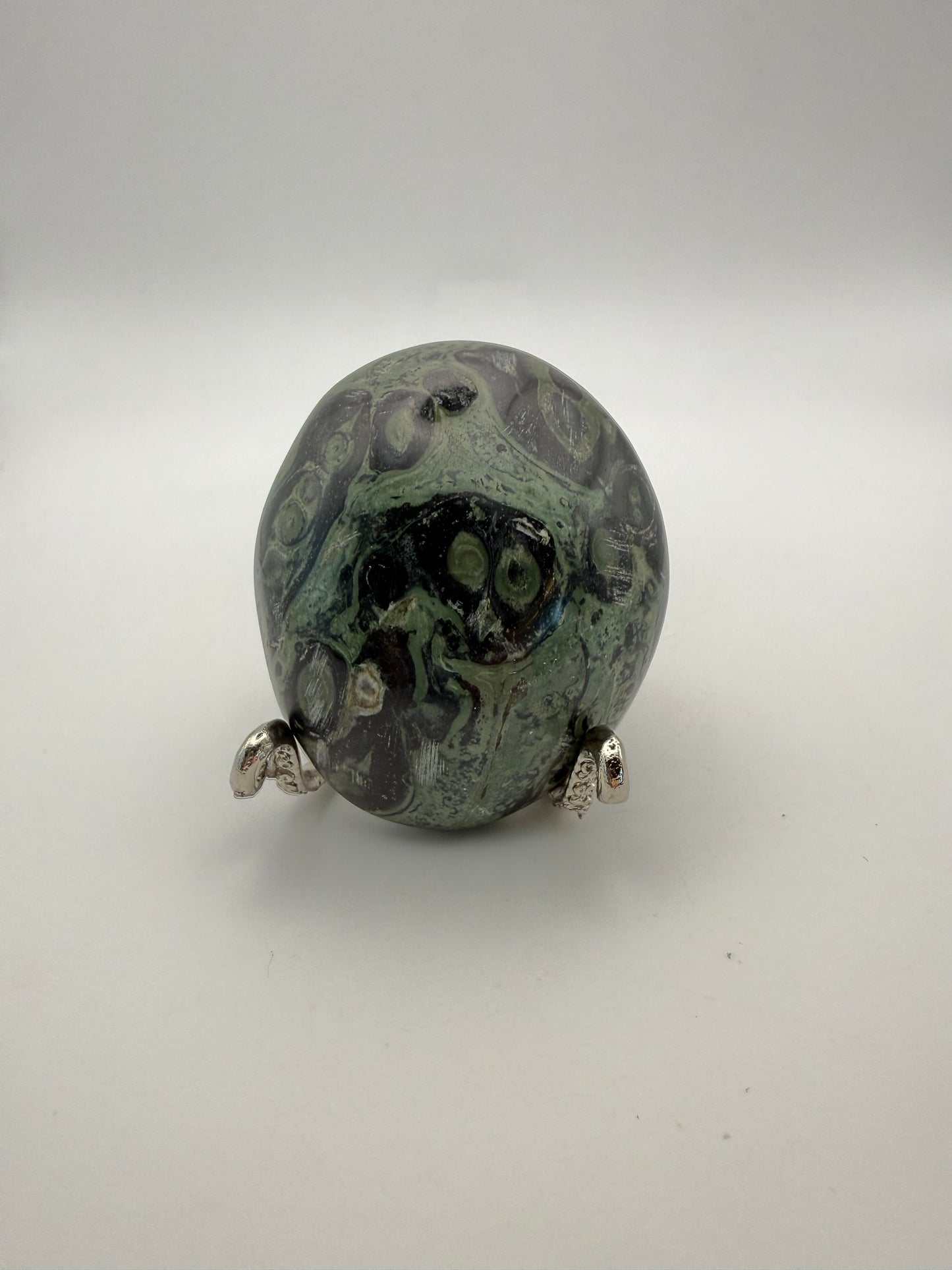 Polished kambaba jasper palm stone.
