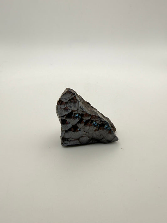 Small raw hematite specimen.