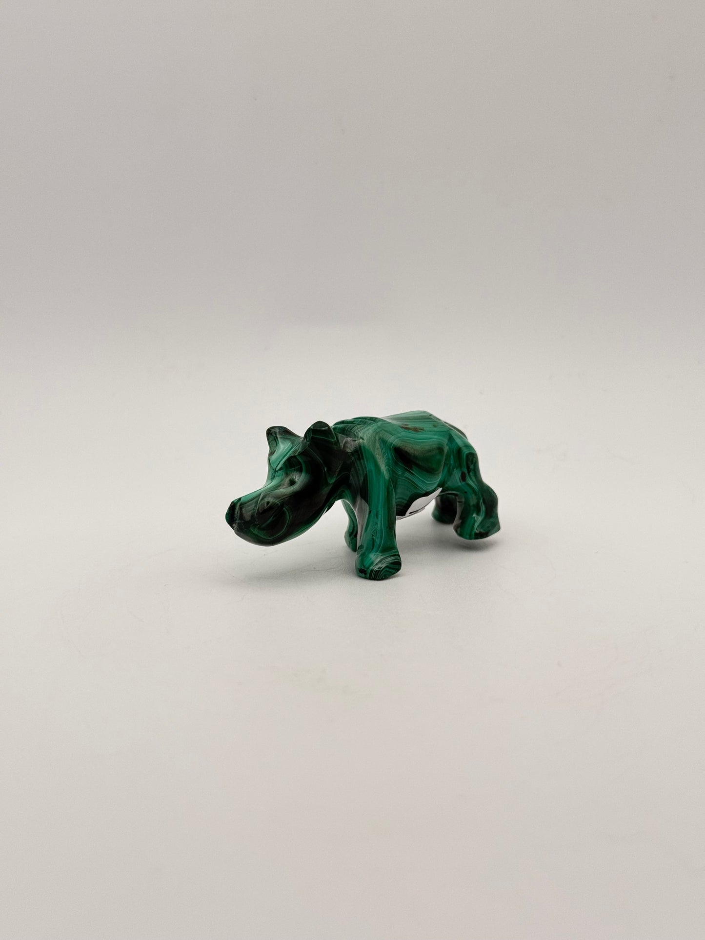 Malachite hippo carving.