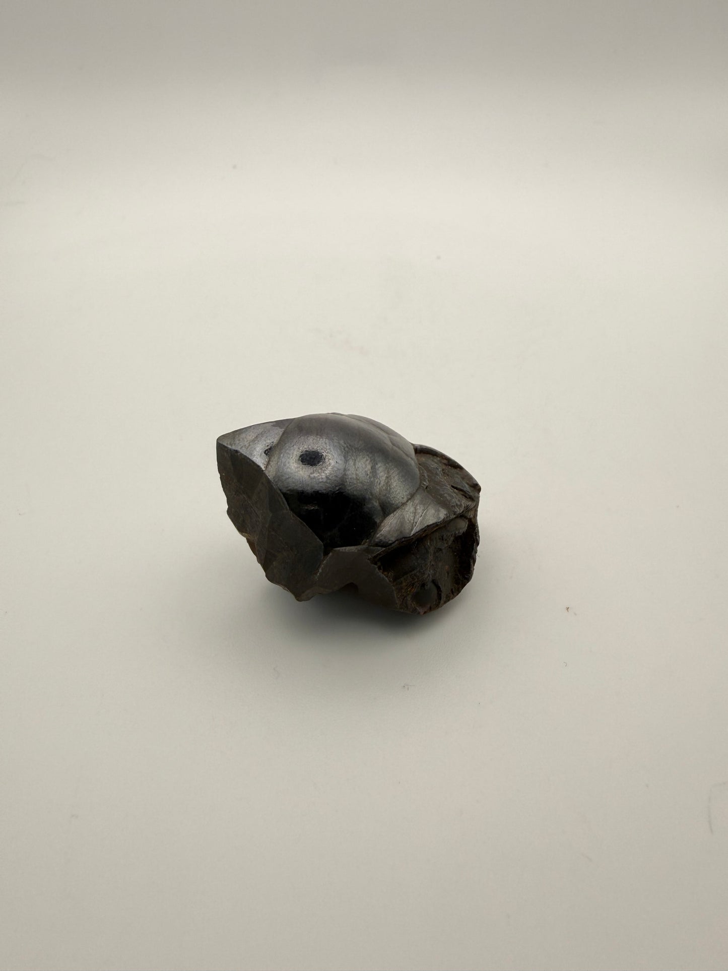 Small raw hematite specimen.