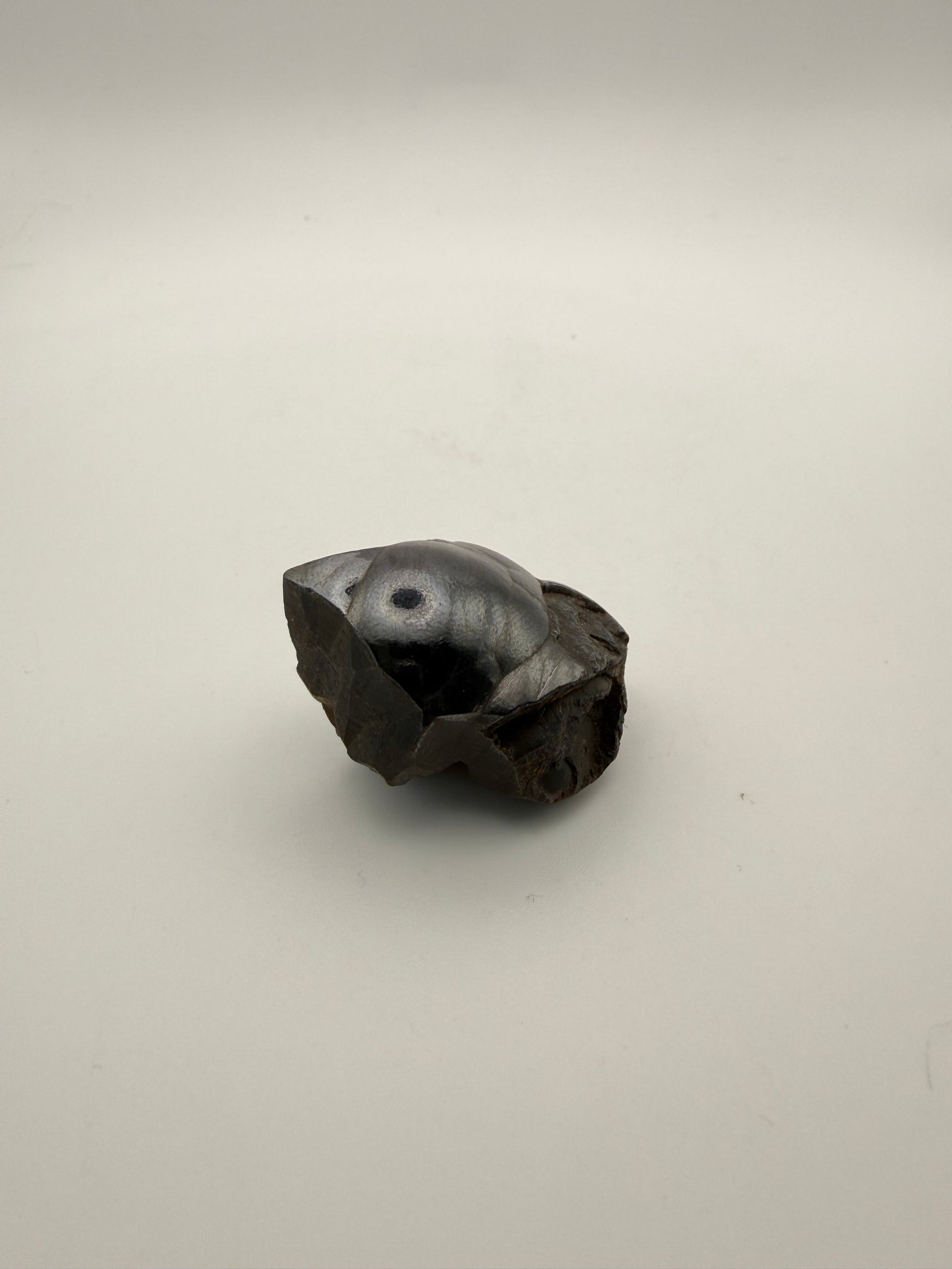 Small raw hematite specimen.