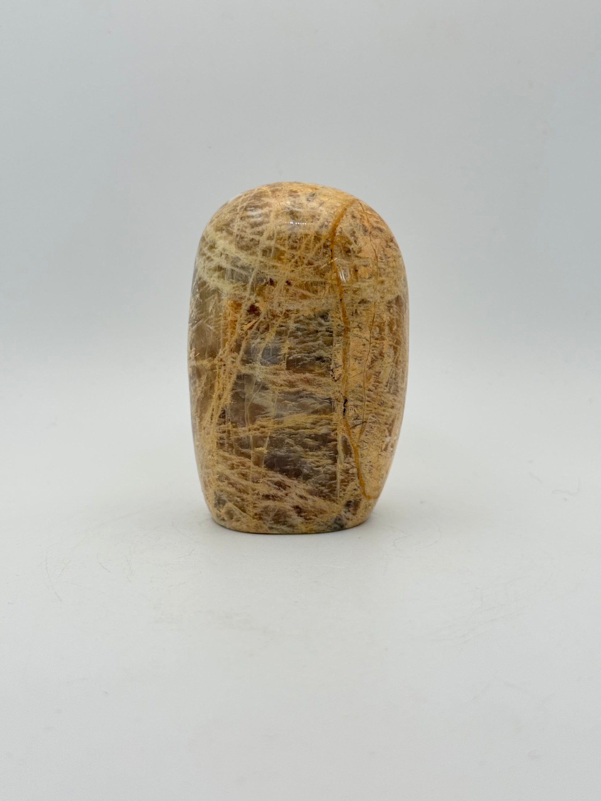 Polished yellow moonstone free form.