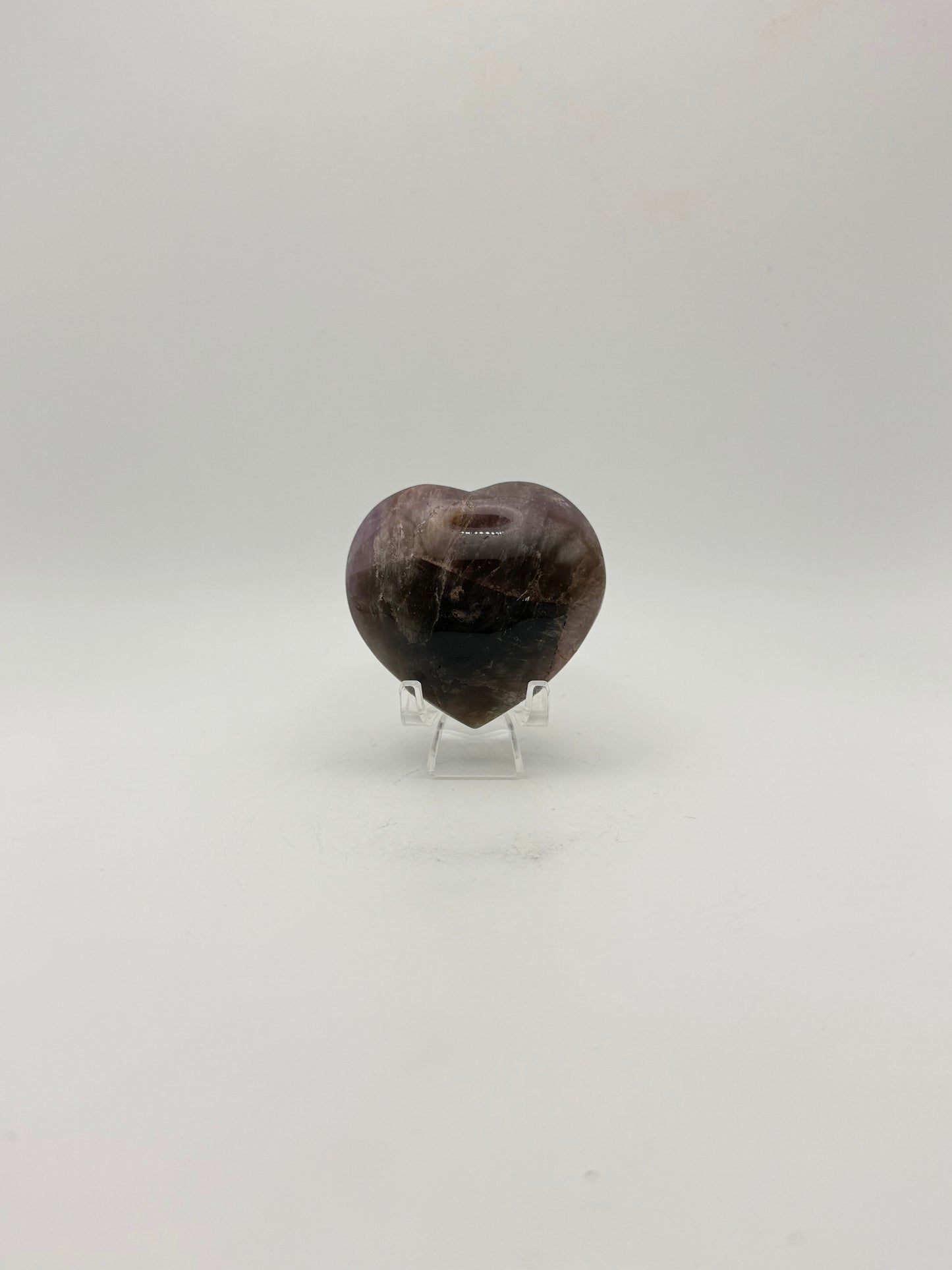 Polished super 7 in the shape of a heart.