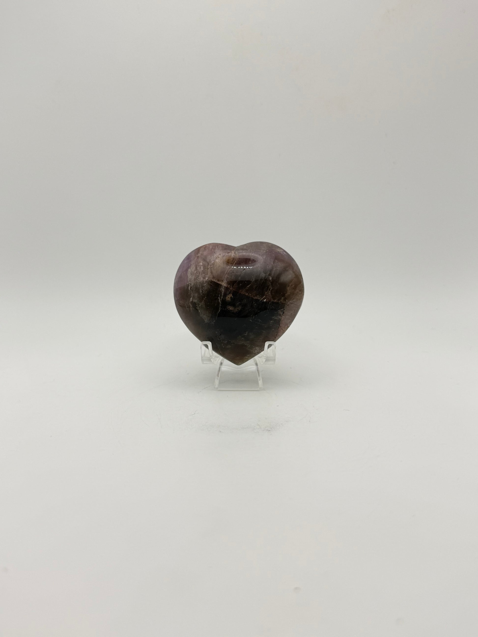 Polished super 7 in the shape of a heart.