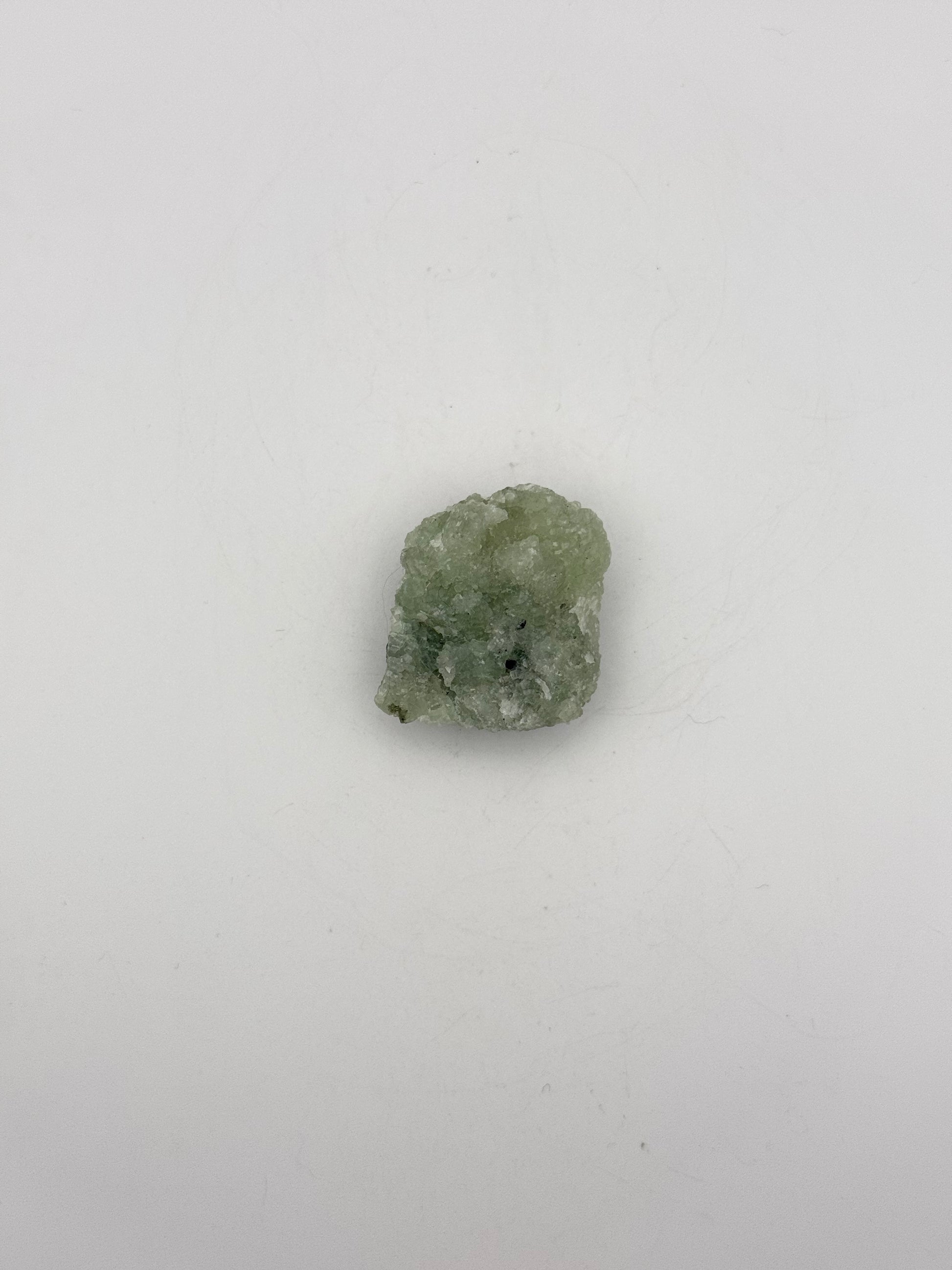 Raw prehnite specimen with amazing green color.