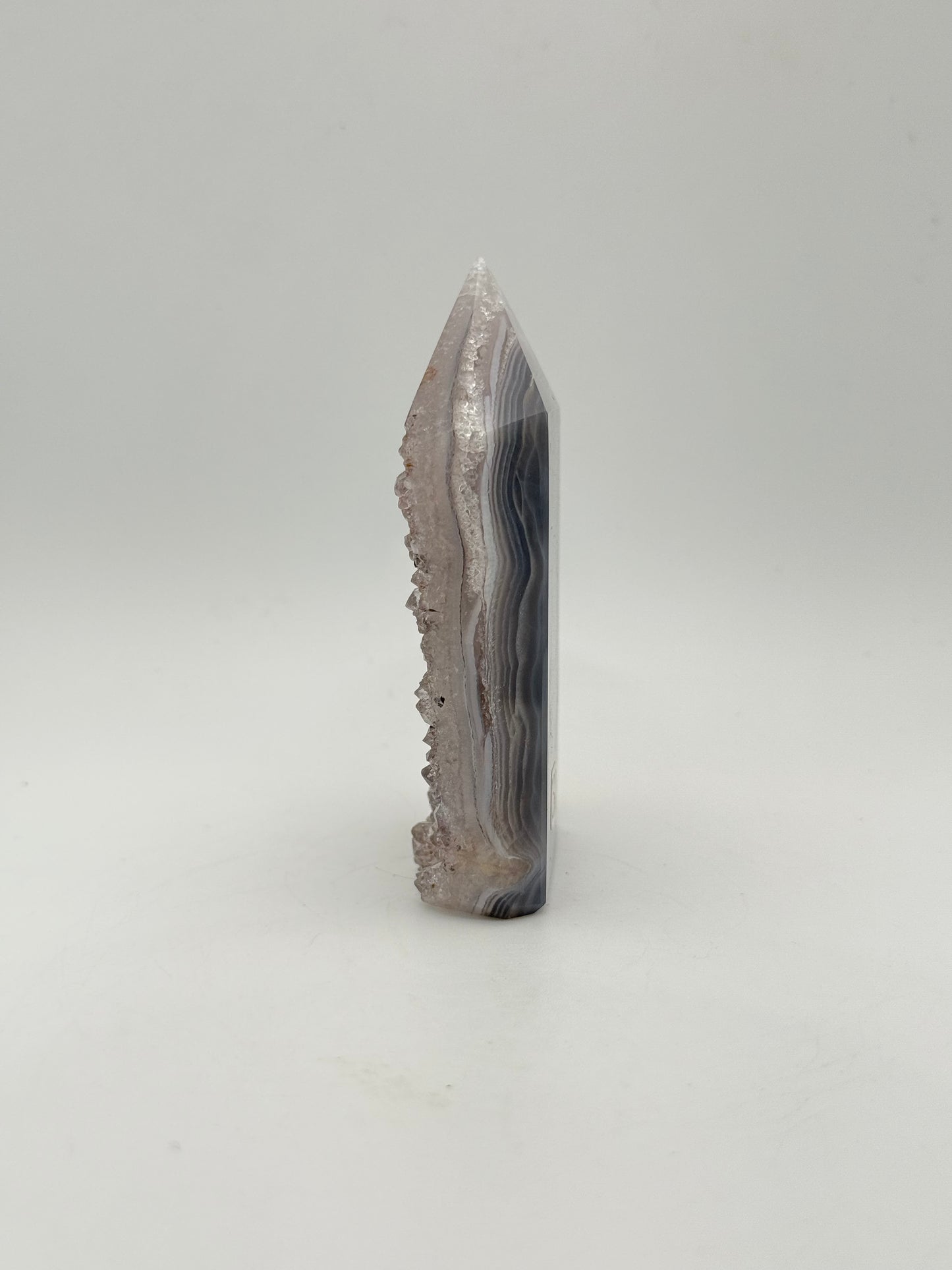 Polished druzy agate tower. About 3.25  inches tall.