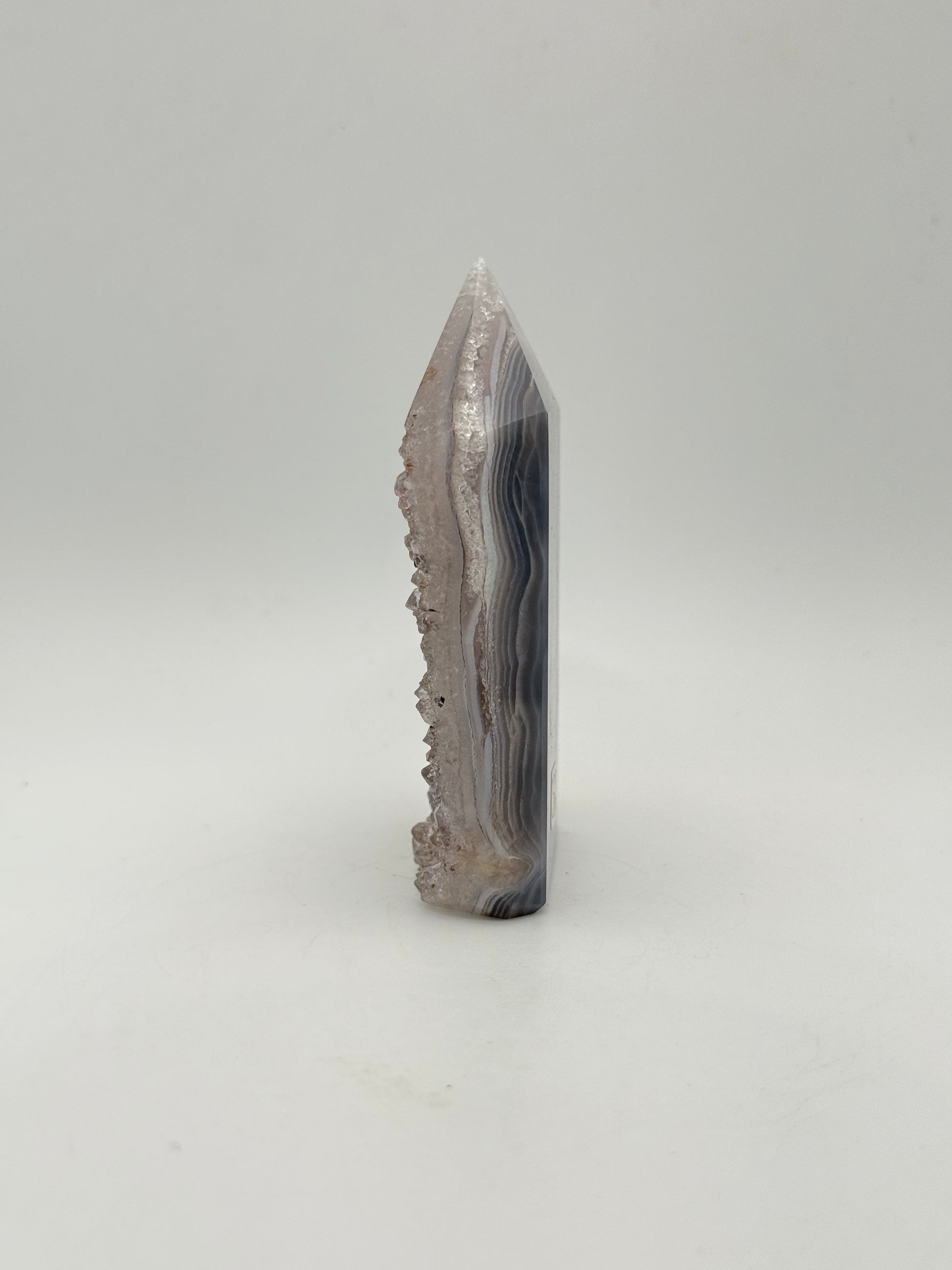 Polished druzy agate tower. About 3.25  inches tall.