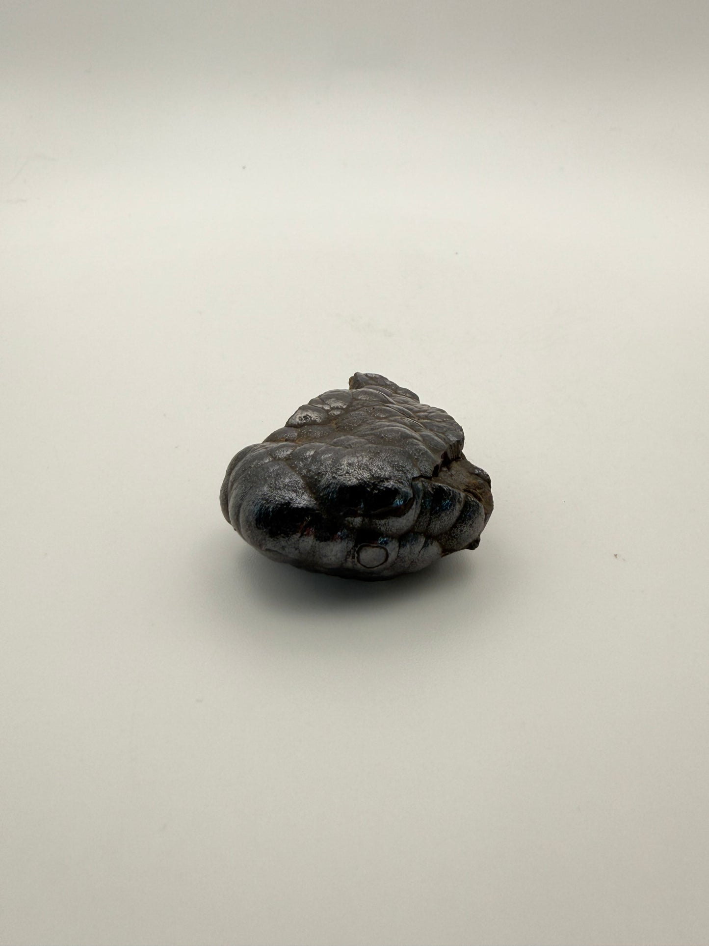 Small raw hematite specimen.
