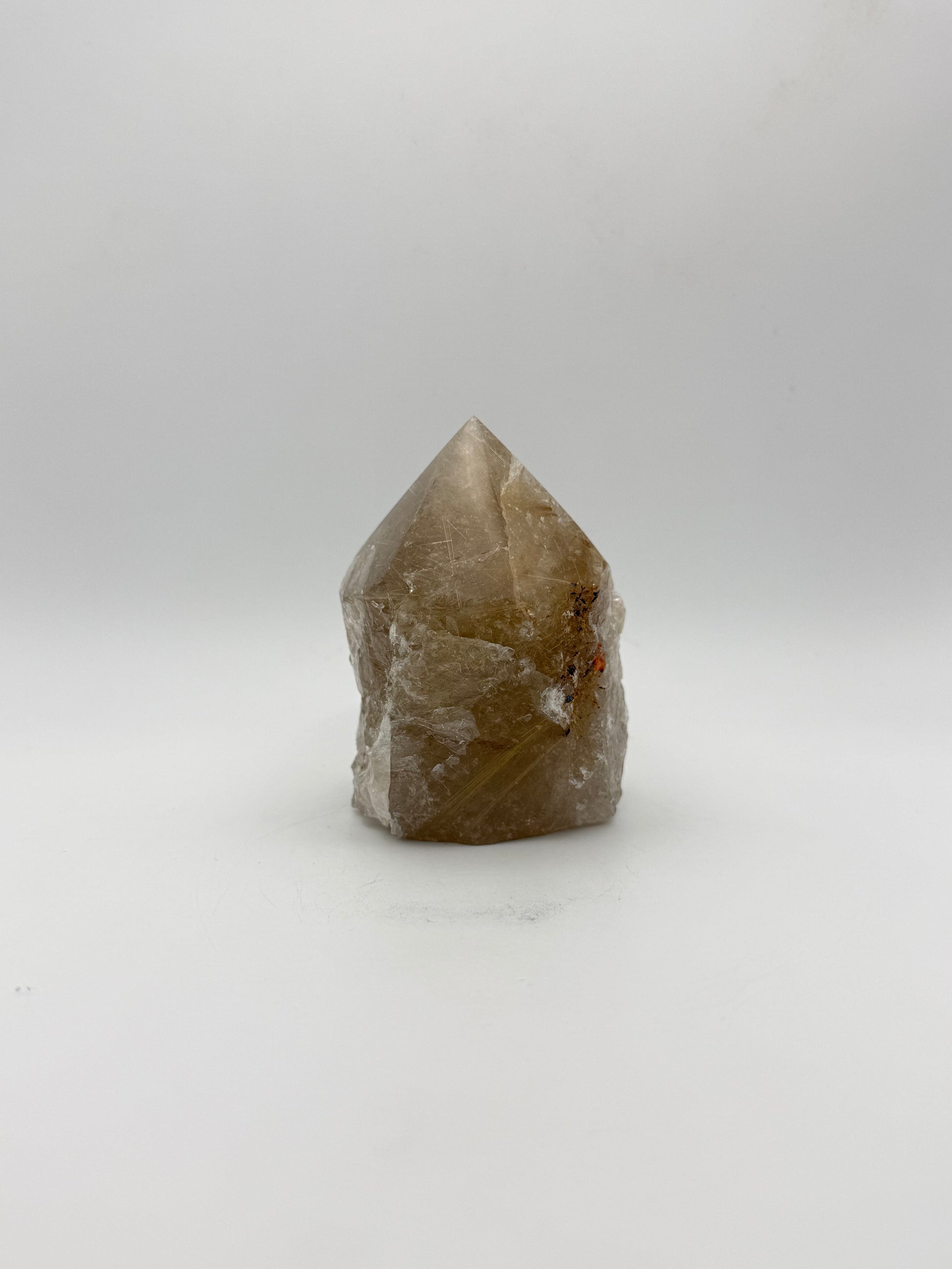 Smoky quartz tower with the top side polished and bottom natural.
