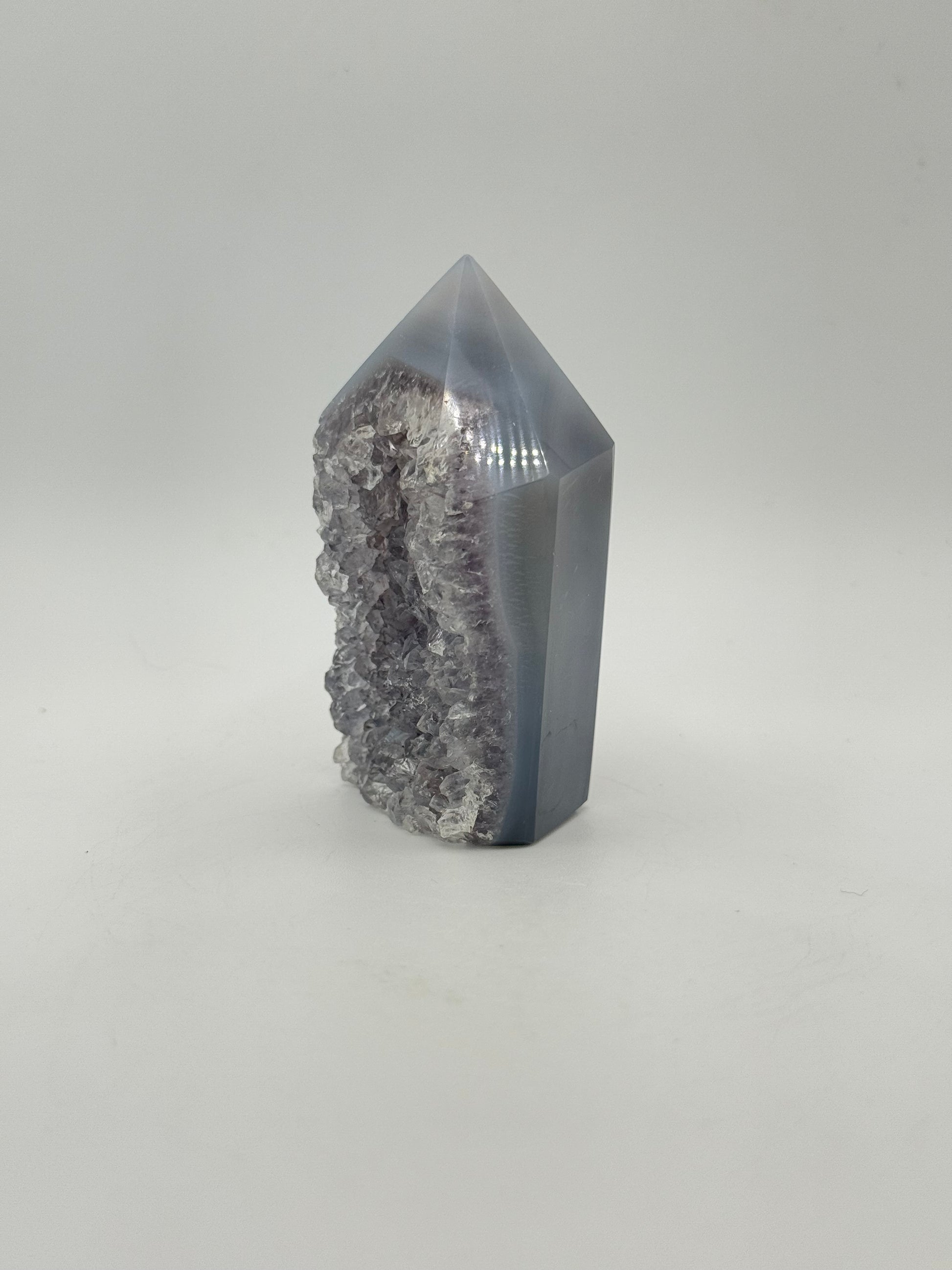 Polished druzy agate tower.