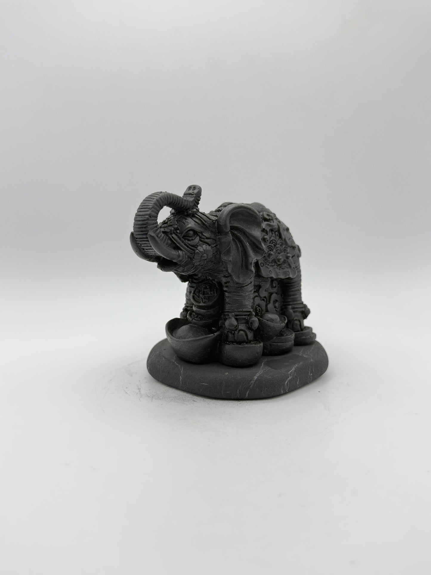 Shungite carving of an elephant.