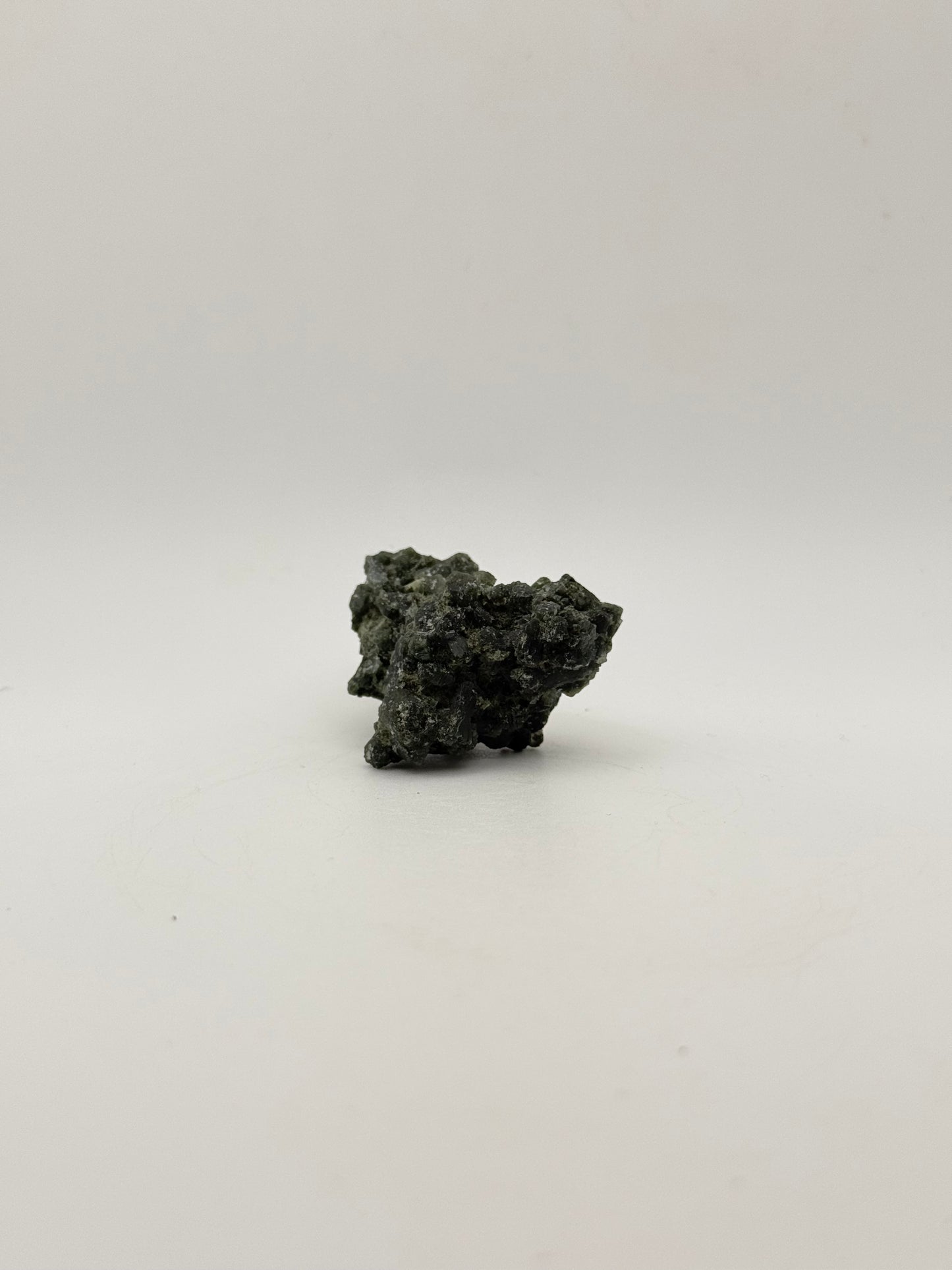 Raw prehnite specimen with amazing green color.