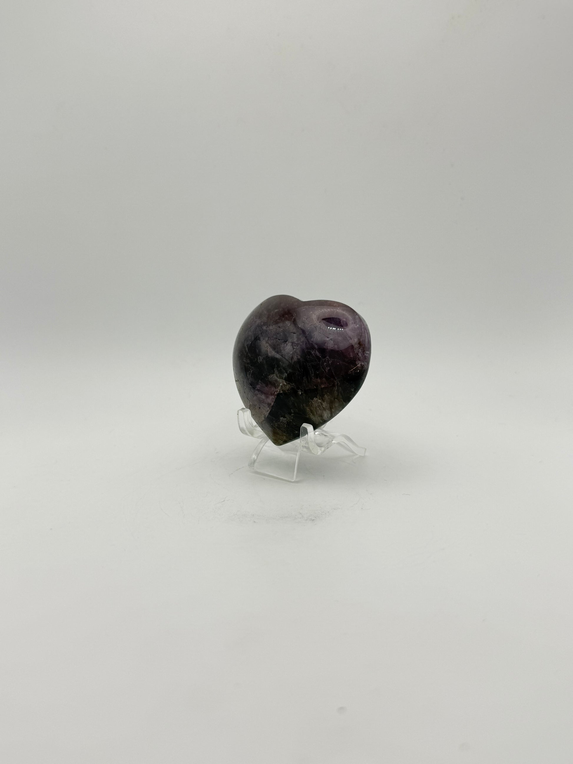 Polished super 7 in the shape of a heart.