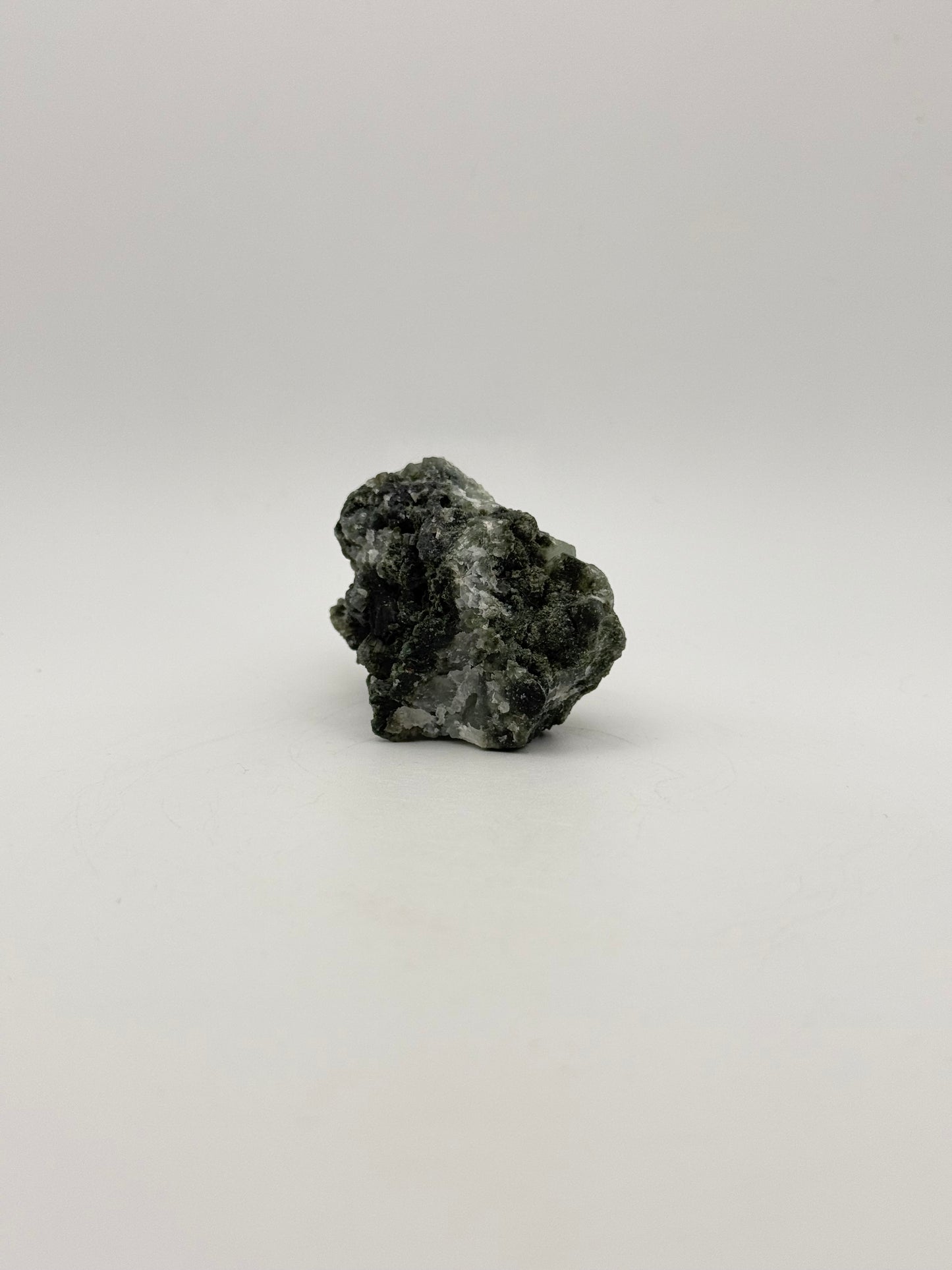 Raw prehnite specimen with amazing green color.