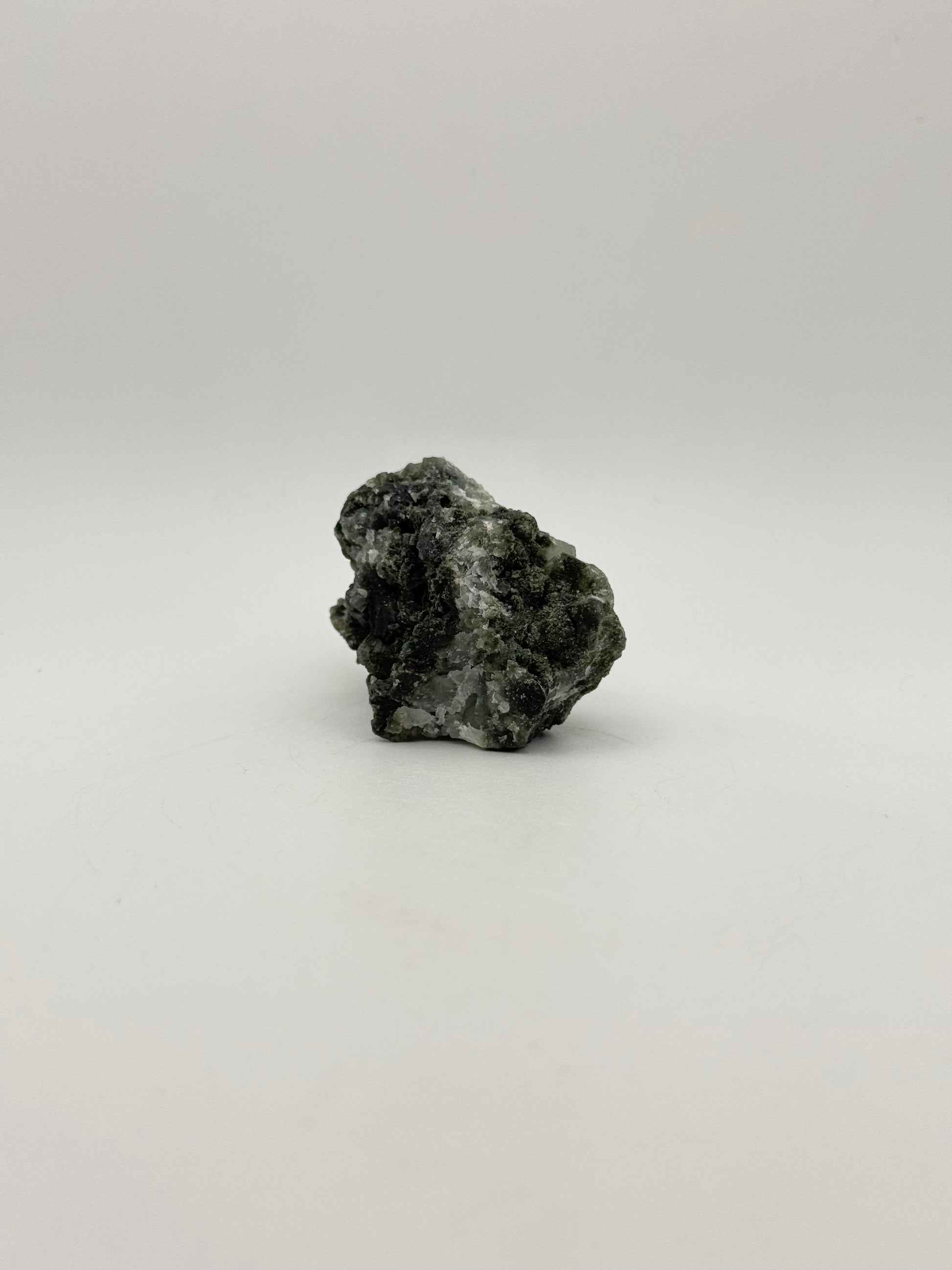 Raw prehnite specimen with amazing green color.