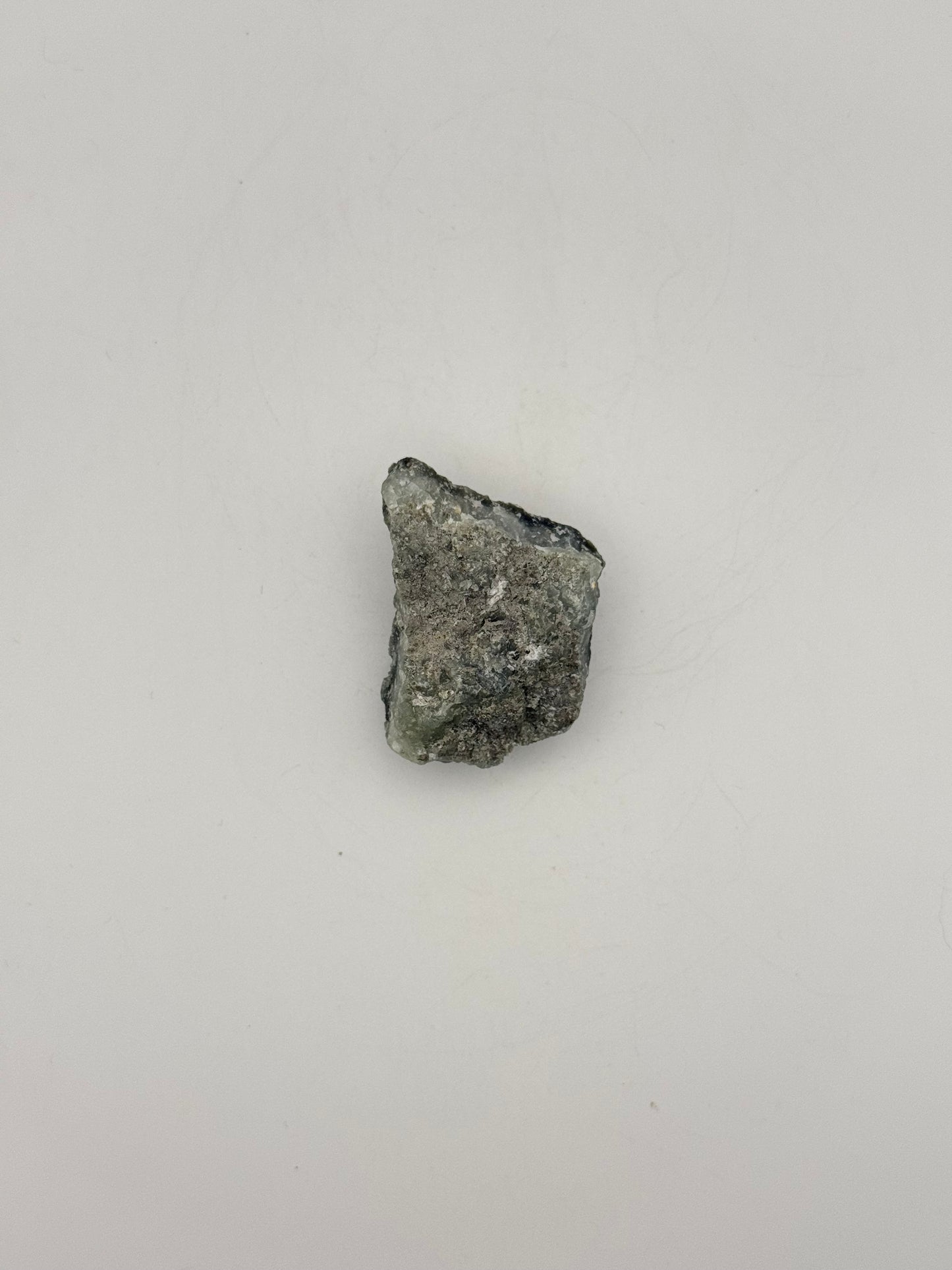 Raw prehnite specimen with amazing green color.