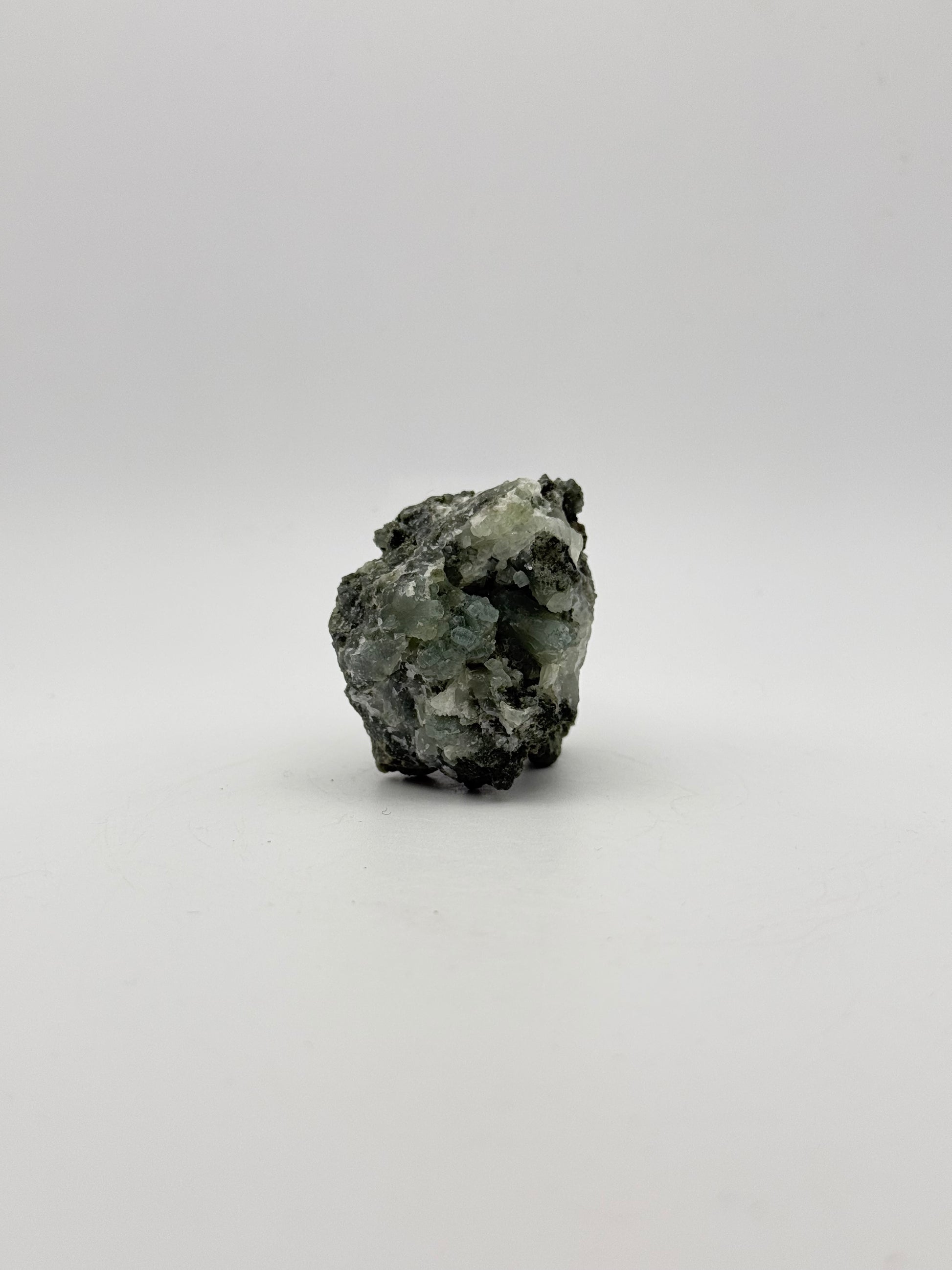 Raw prehnite specimen with amazing green color.