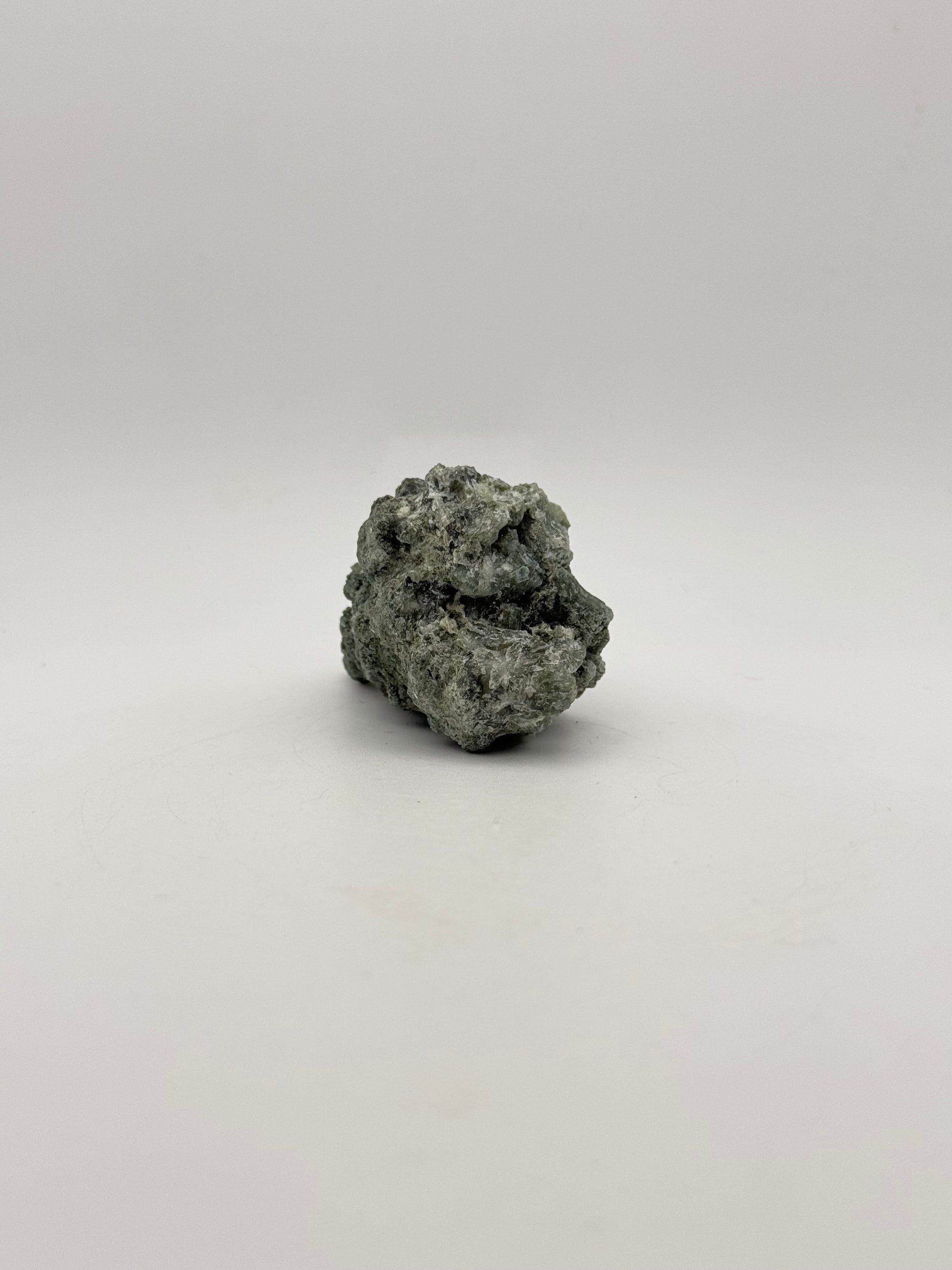 Raw prehnite specimen with amazing green color.