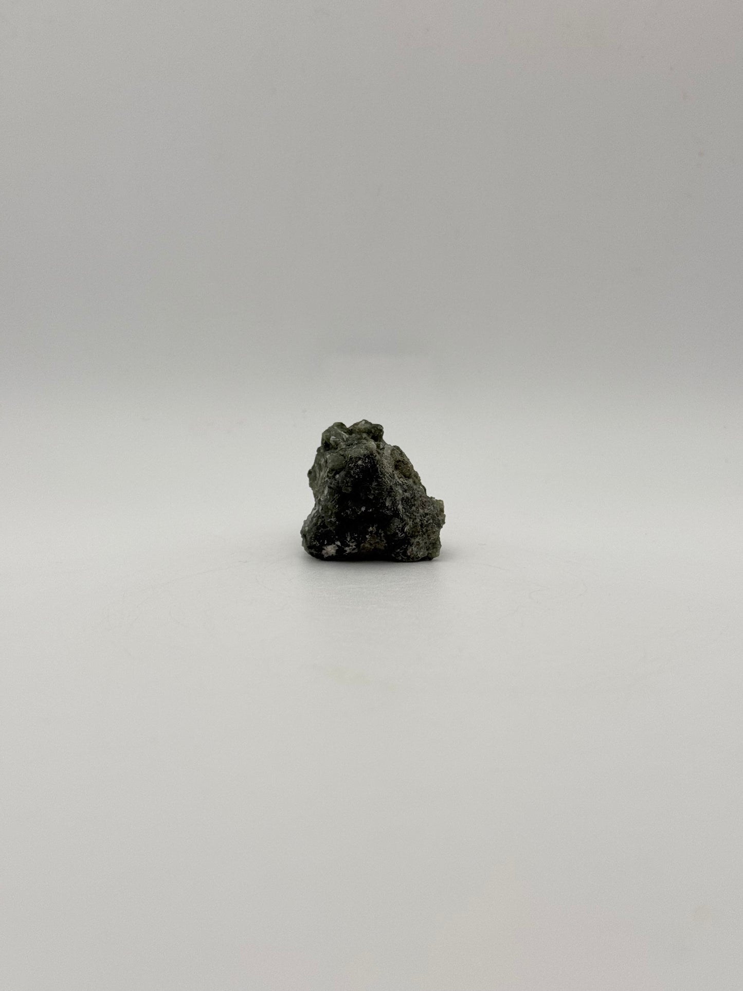 Raw prehnite specimen with amazing green color.