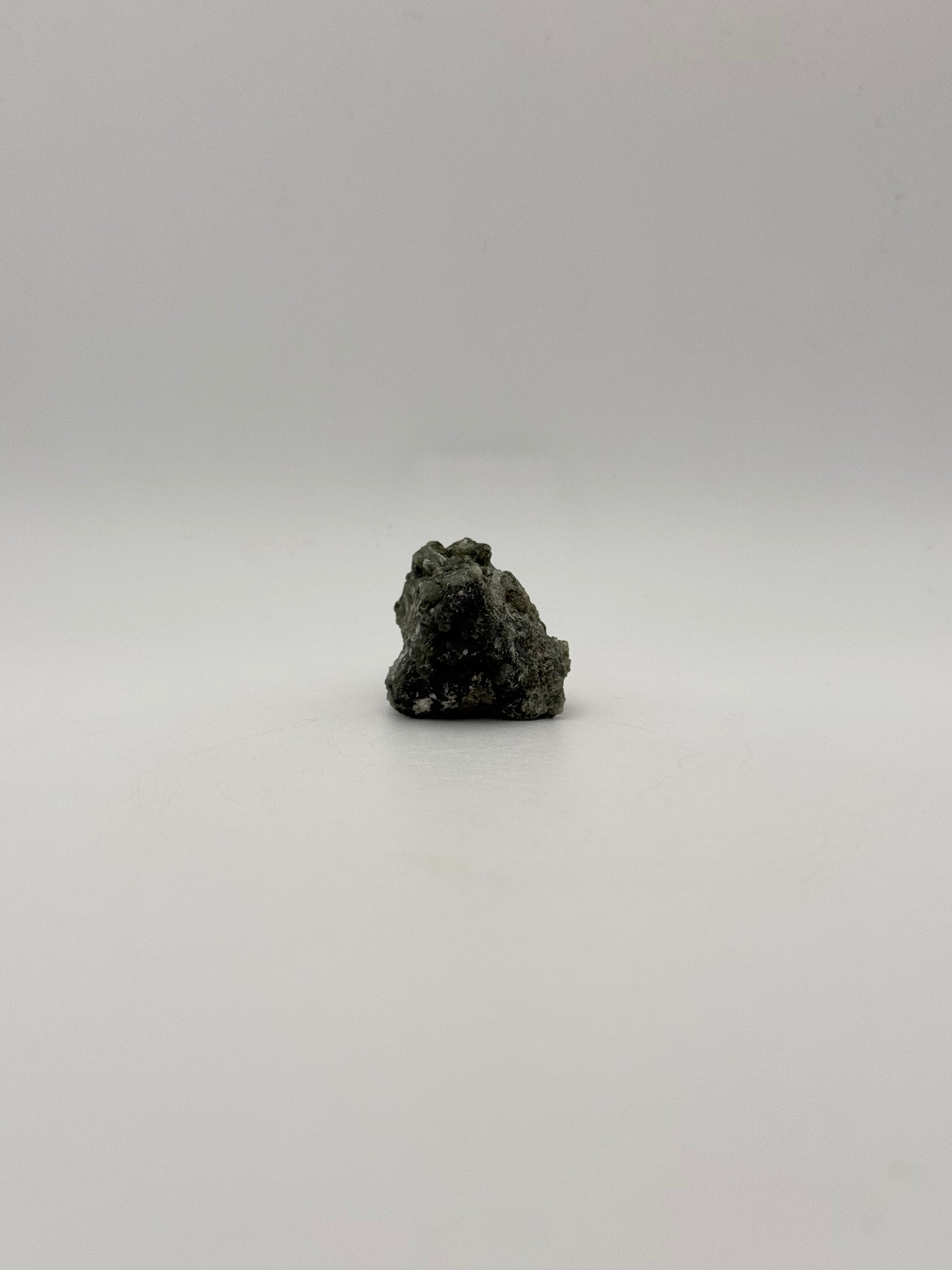 Raw prehnite specimen with amazing green color.