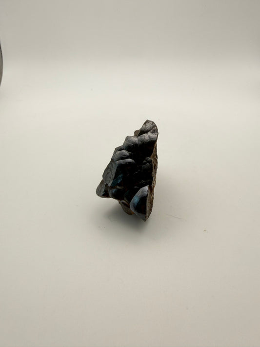 Small raw hematite specimen.