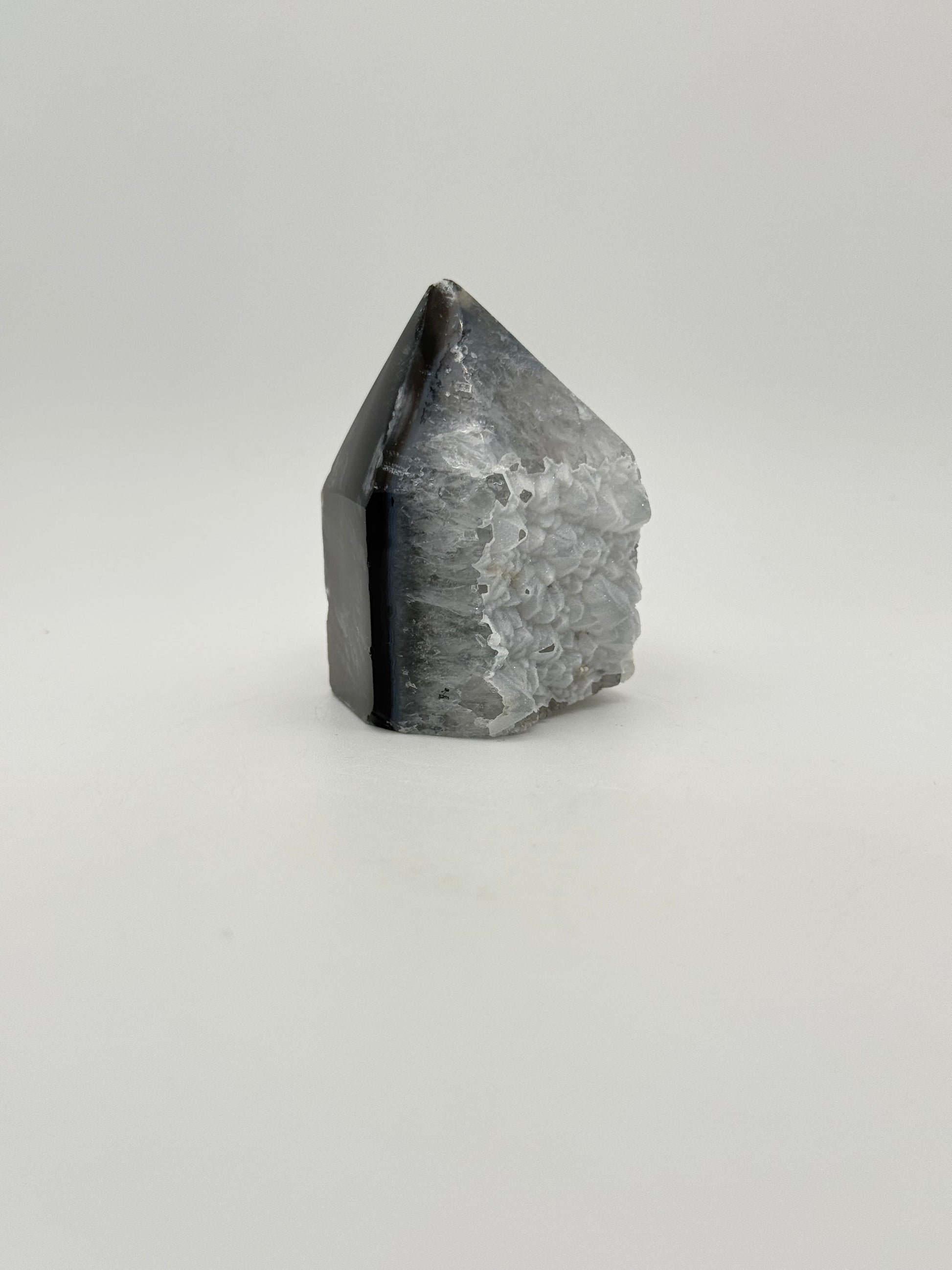 Polished druzy agate tower. About 2.25  inches tall.
