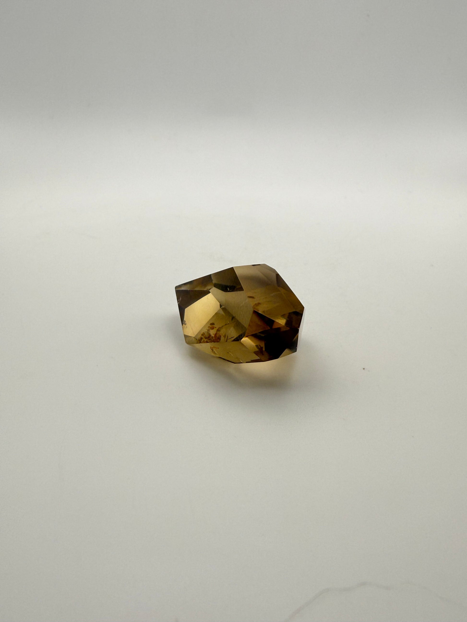 Polished natural citrine point.