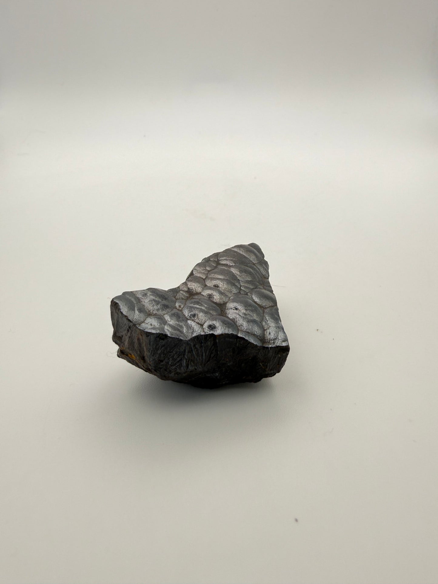 Small raw hematite specimen.