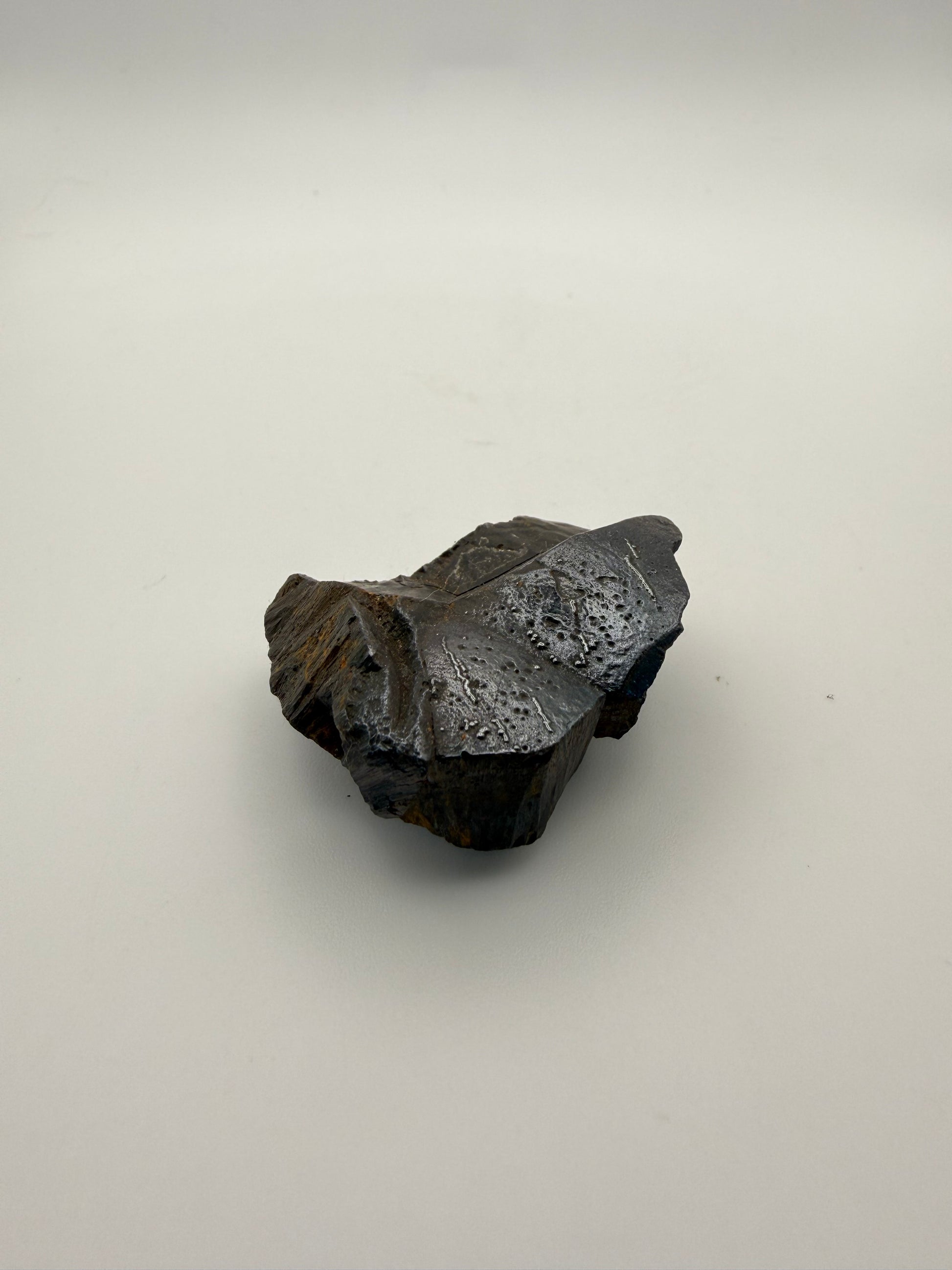 Small raw hematite specimen.