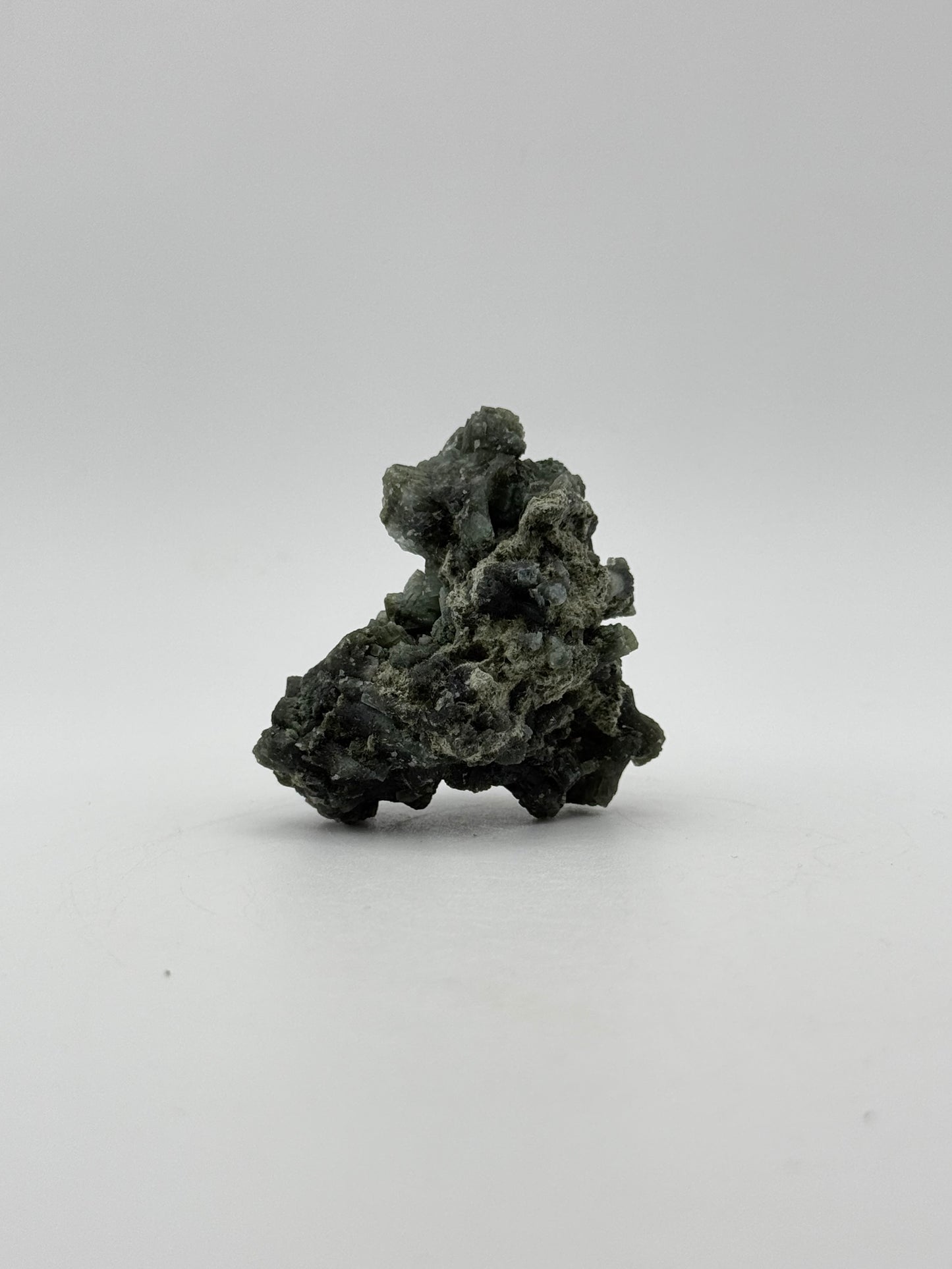 Raw prehnite specimen with amazing green color.