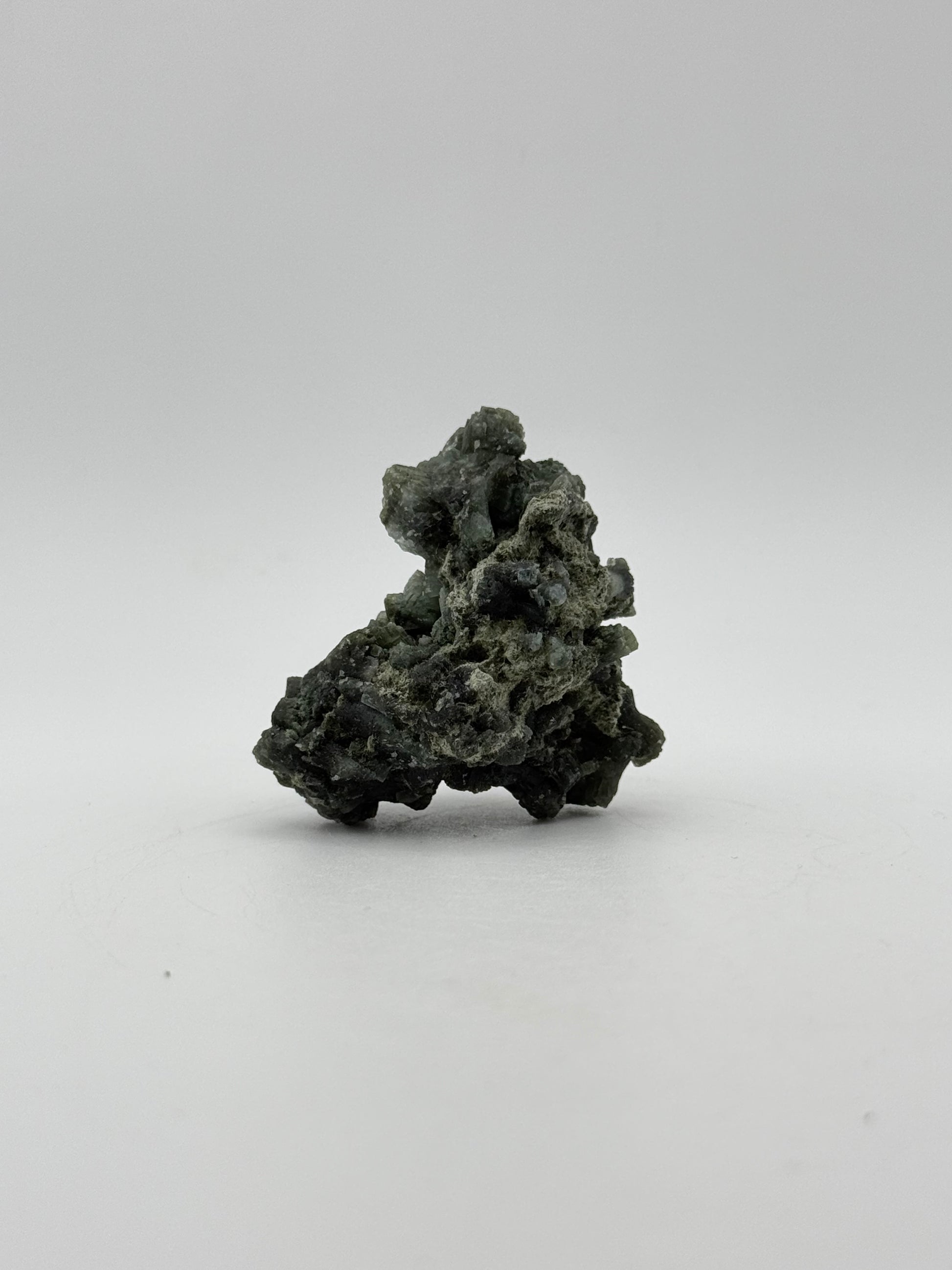 Raw prehnite specimen with amazing green color.