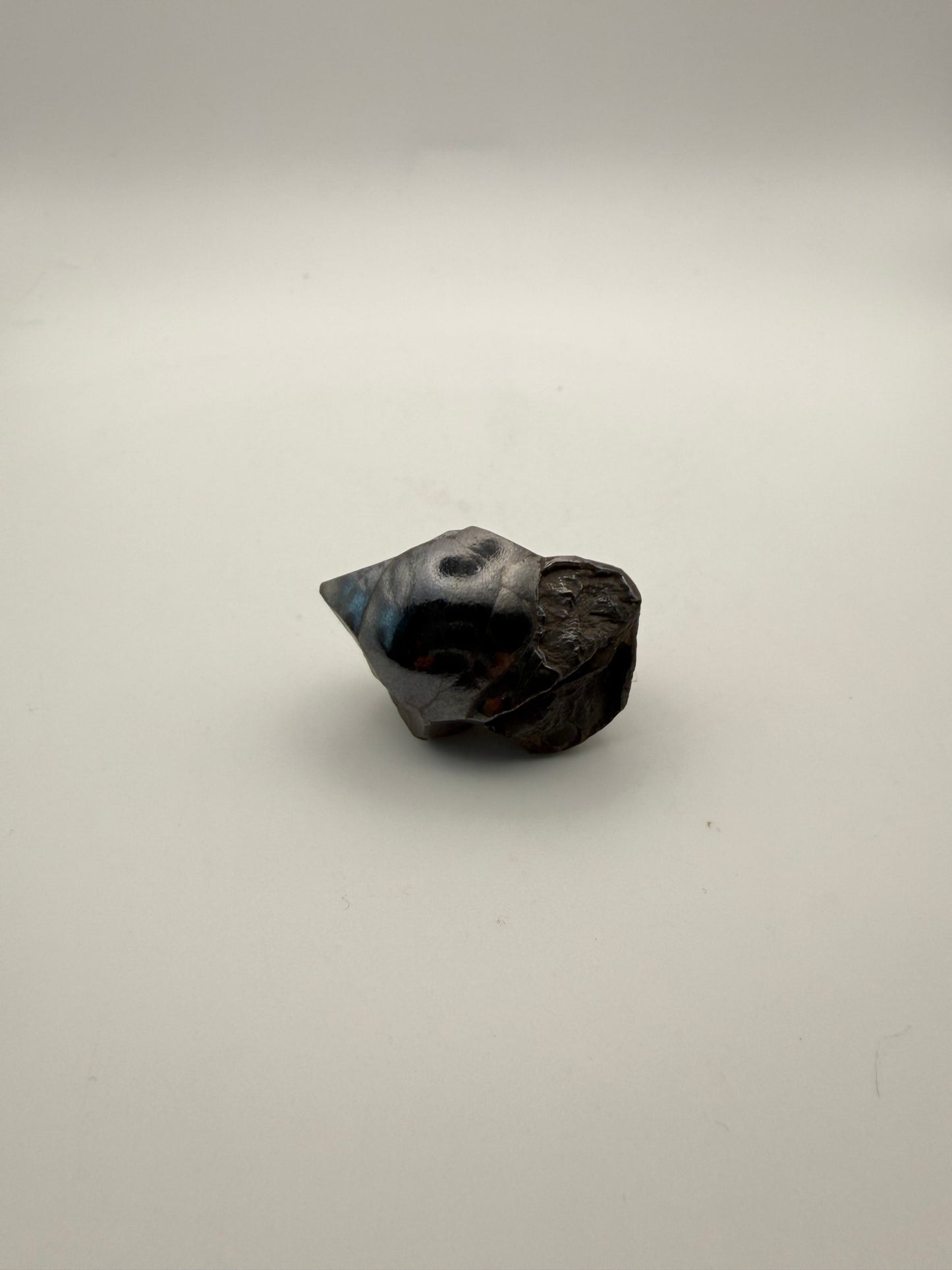 Small raw hematite specimen.