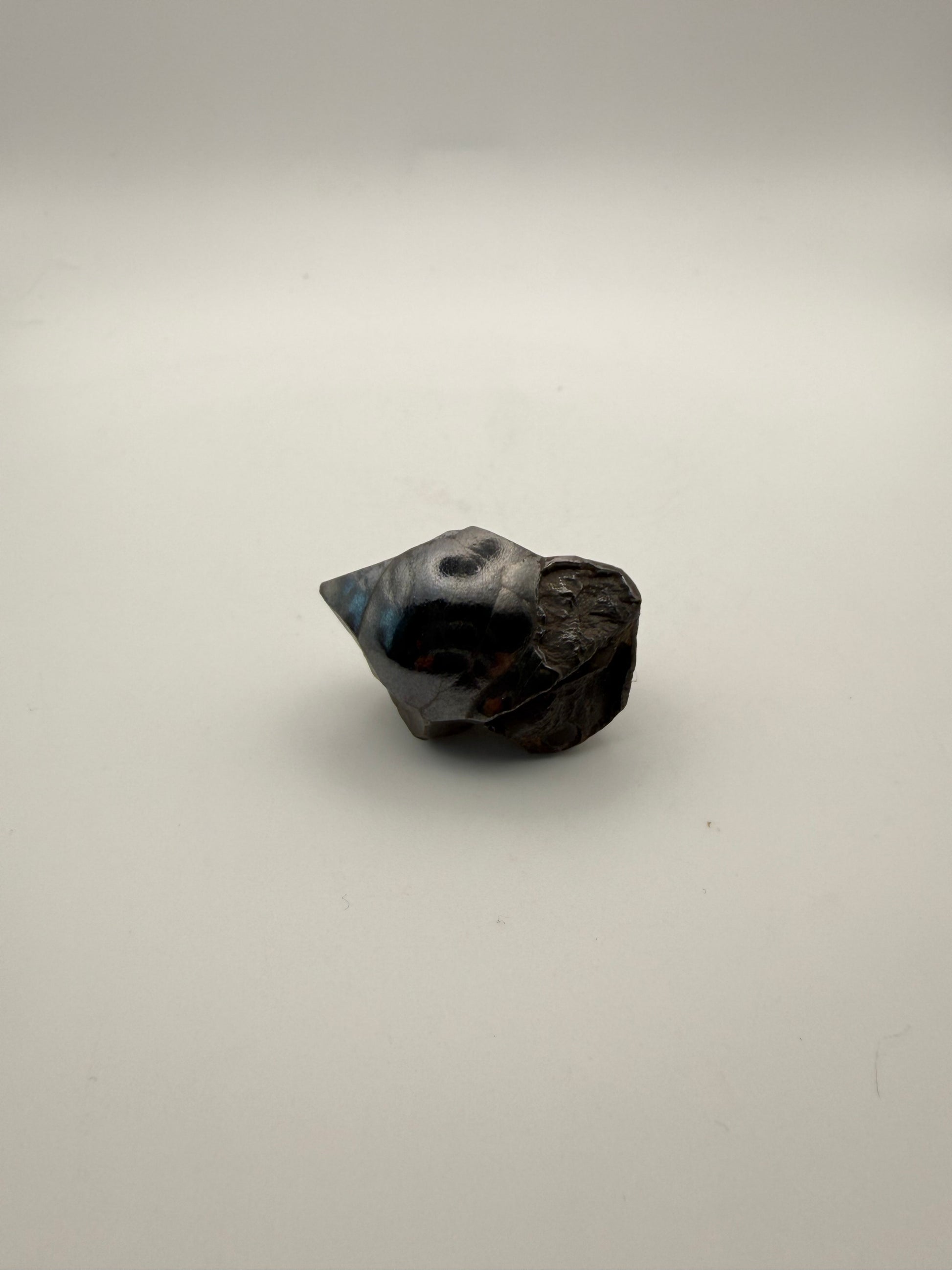 Small raw hematite specimen.