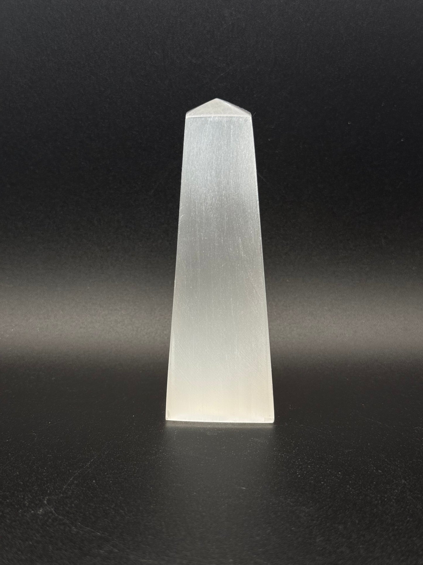 Selenite tower that is 10cm tall.