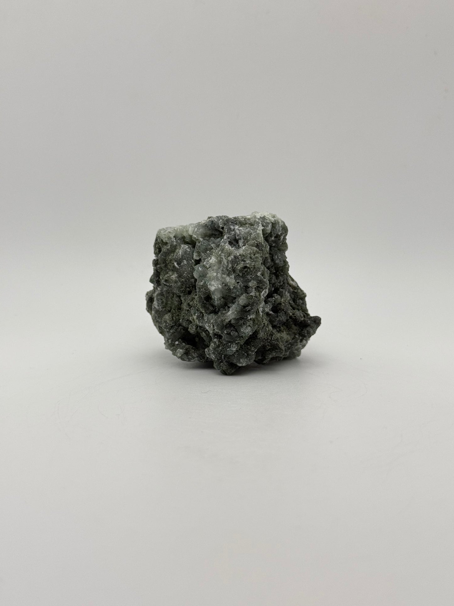 Raw prehnite specimen with amazing green color.