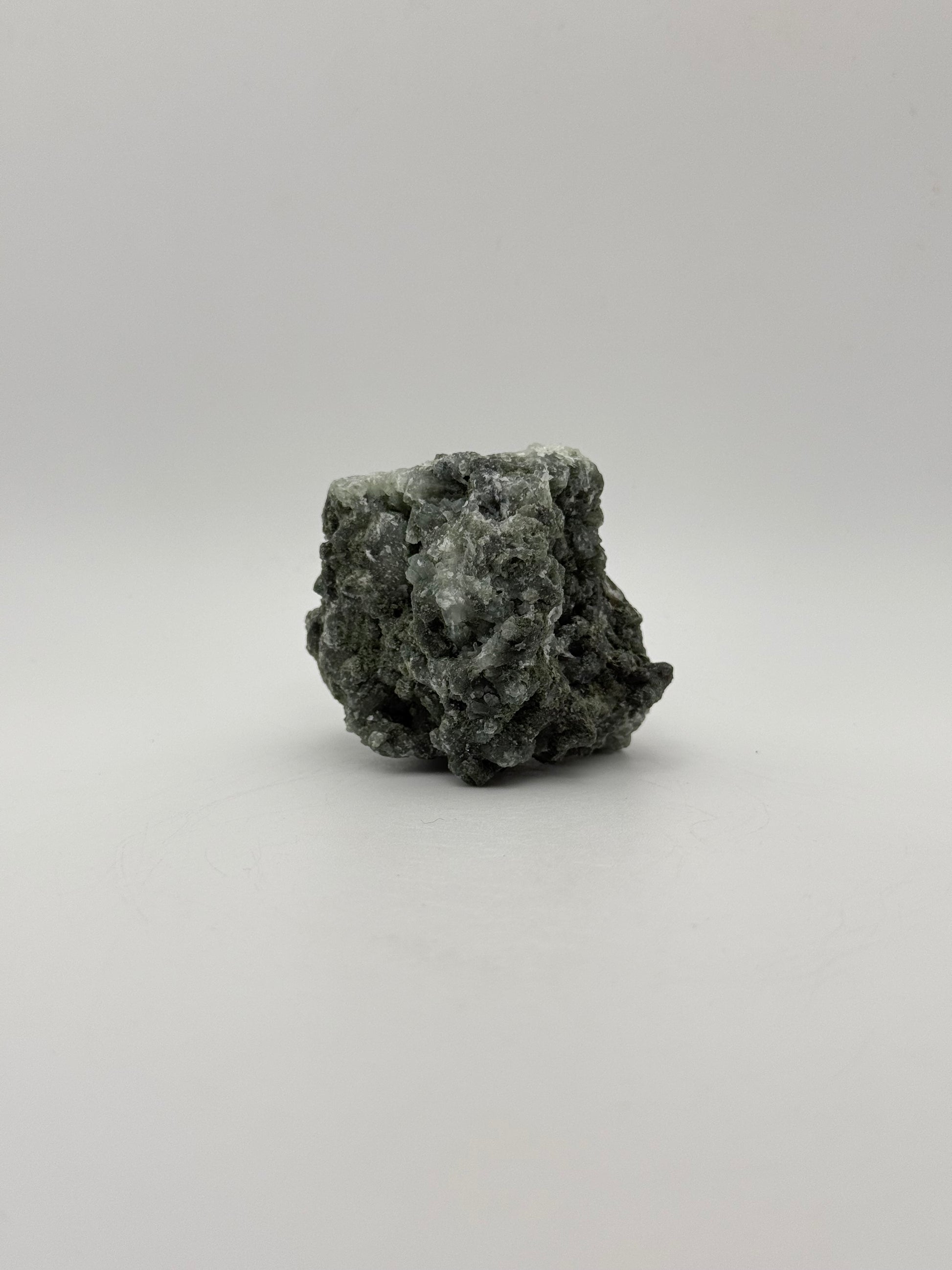 Raw prehnite specimen with amazing green color.